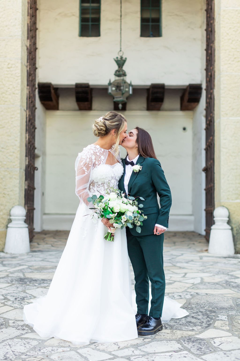 www.santabarbarawedding.com | Weddings by the Sea | Santa Barbara Courthouse | Kevin Qian | Cate Forest Designs | Couple in Front of Courthouse Doors