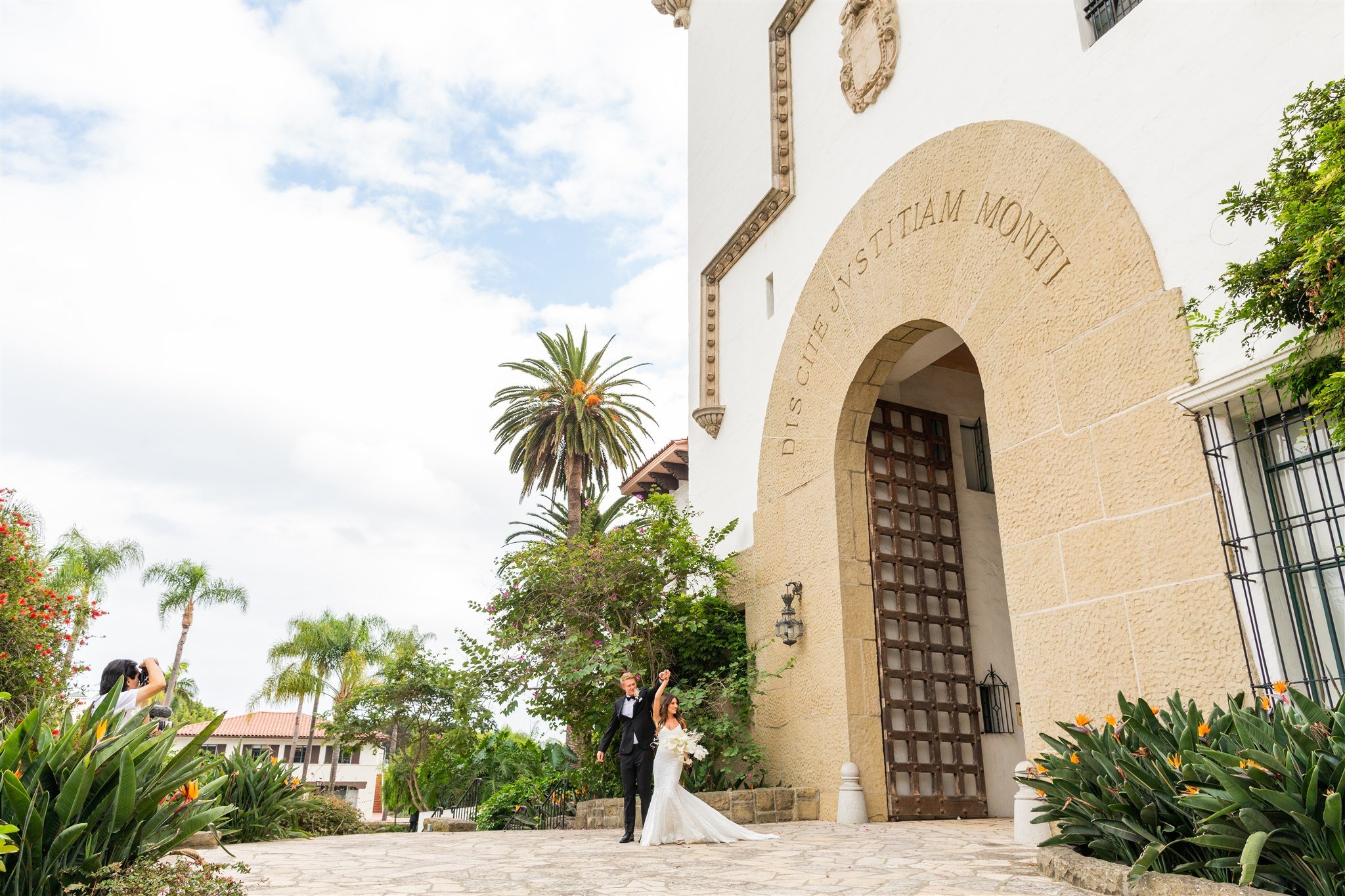 www.santabarbarawedding.com | Events by Fran | Wonder Tribe | Santa Barbara Courthouse | Beauty by Leah Rose | Amari Salon &amp; Spa | Wild West Florals | Bride and Groom at Front of Venue
