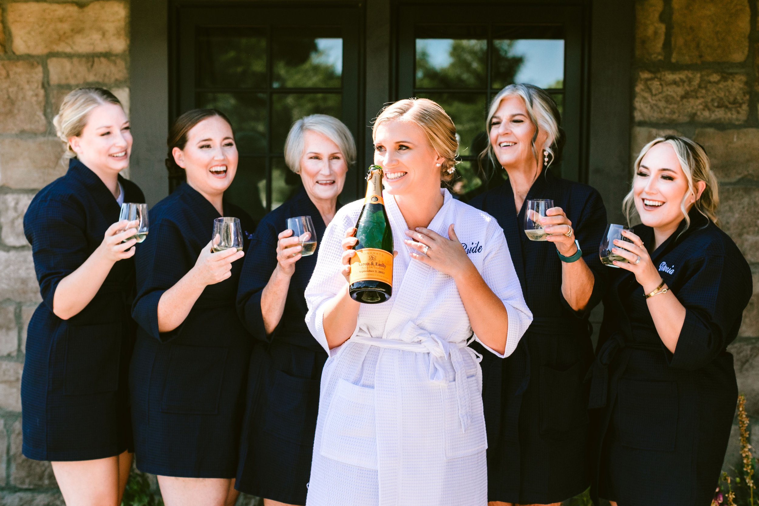 www.santabarbarawedding.com | Zaca Creek | Kathy DeNinno Photography | Wunderland &amp; Co. | By Meagan Renee | Bride Drinking Champagne with Bridesmaids in PJs