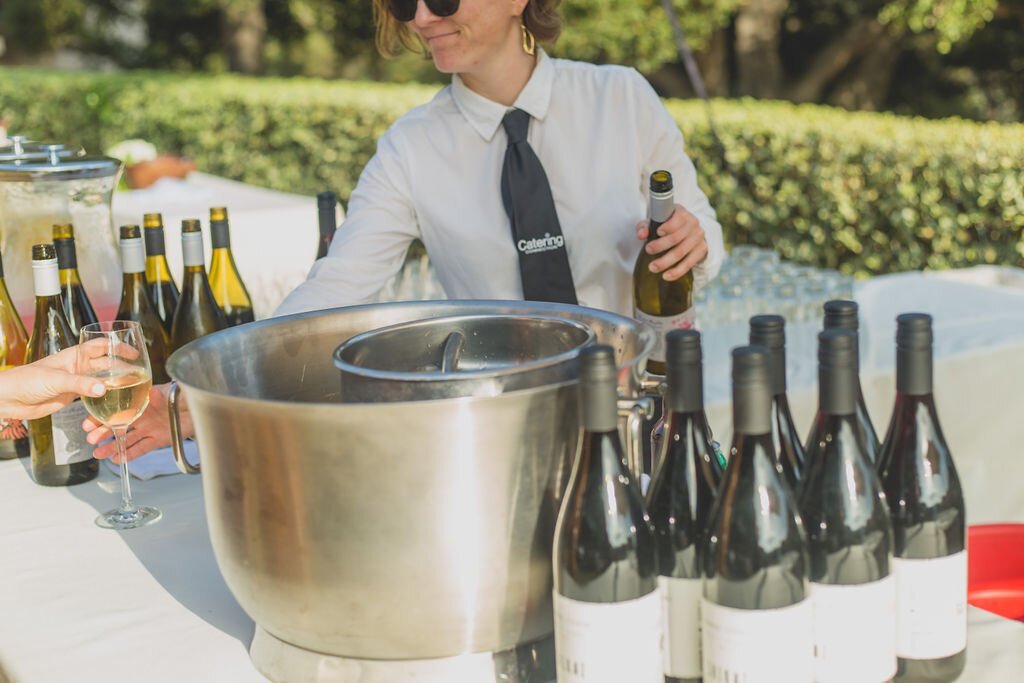 www.santabarbarawedding.com | Catering Connection | Yours Truly Media | Bartender Serving at Wedding Reception