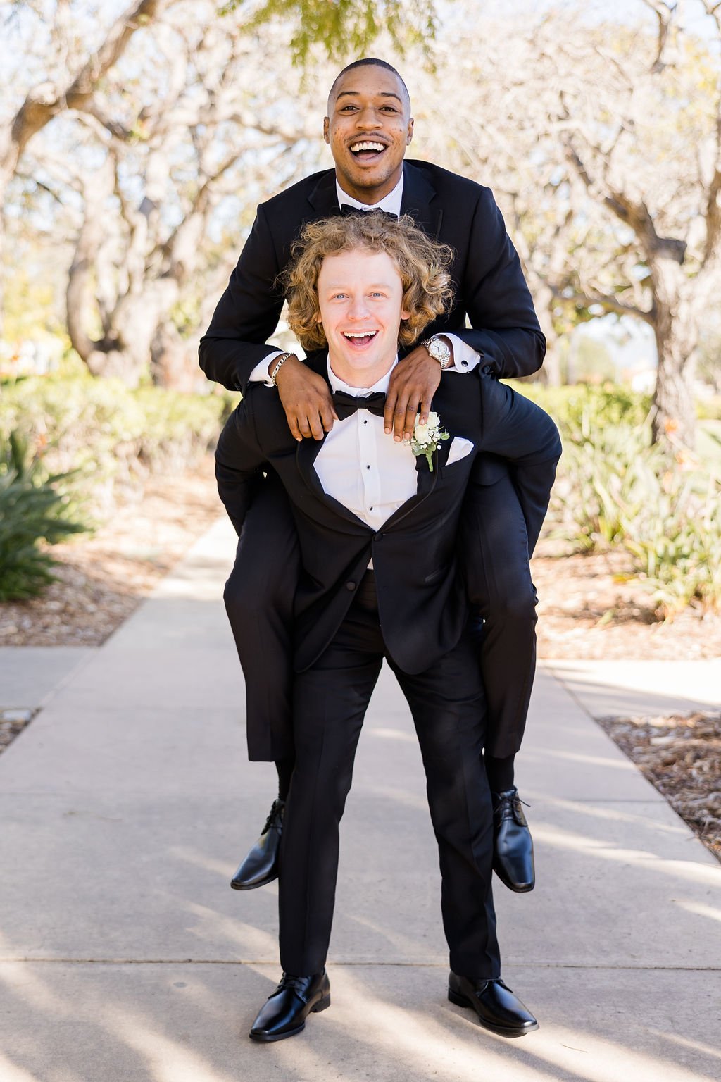 www.santabarbarawedding.com | Events by Fran | Kelsey Rinaldi | Spanish Hills Club | Casa Blanca Flowers | Friar Tux | Groom on Groomsman’s Back