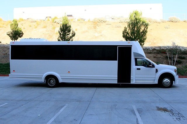 www.santabarbarawedding.com | Elegant Image Limousine | White Shuttle Bus Parked Outside