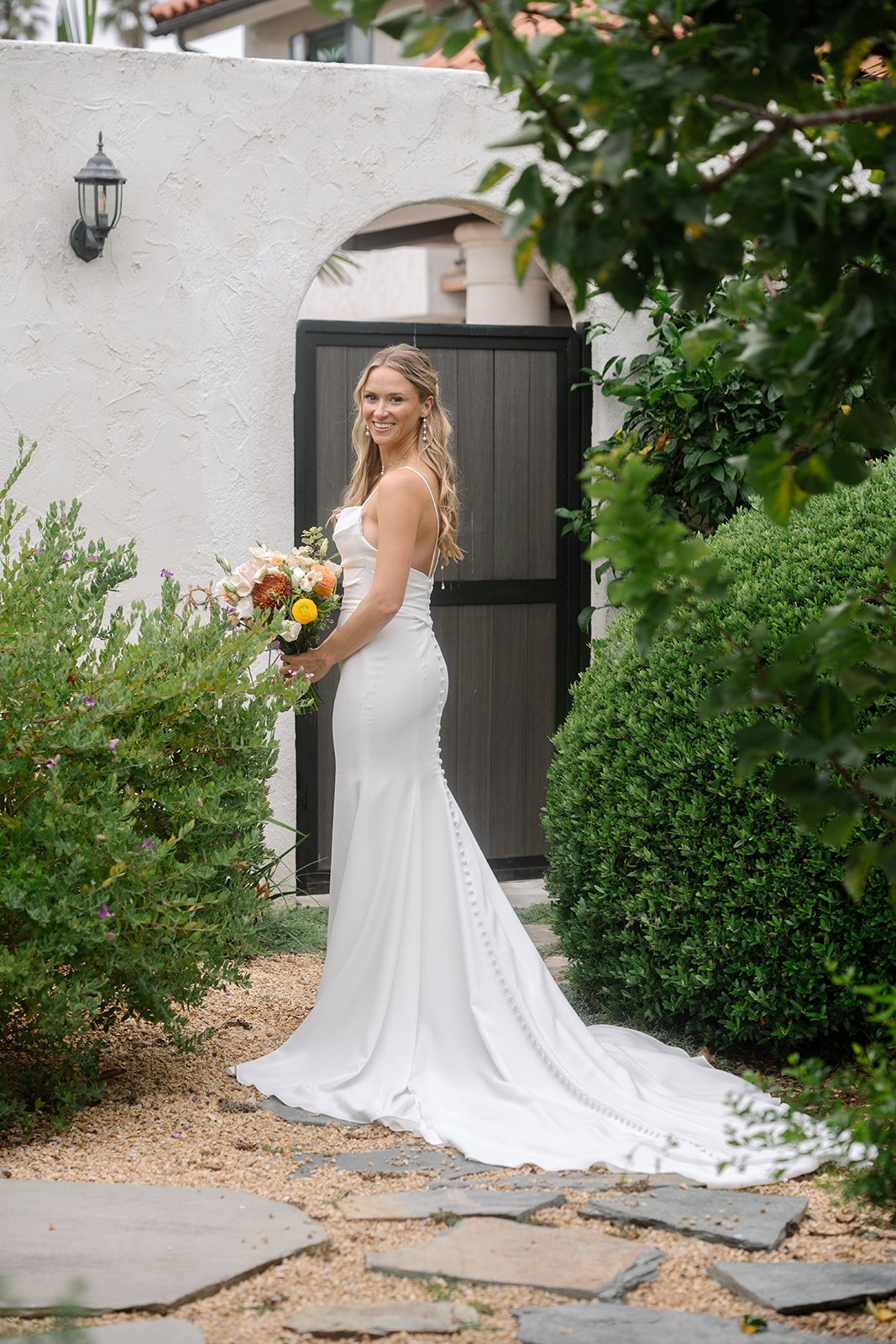 www.santabarbarawedding.com | Lina Bell | Ann Johnson Events | SB Historical Museum | The Poppy Pod | Blushing Beauty | Bride Holding Bouquet Before Ceremony