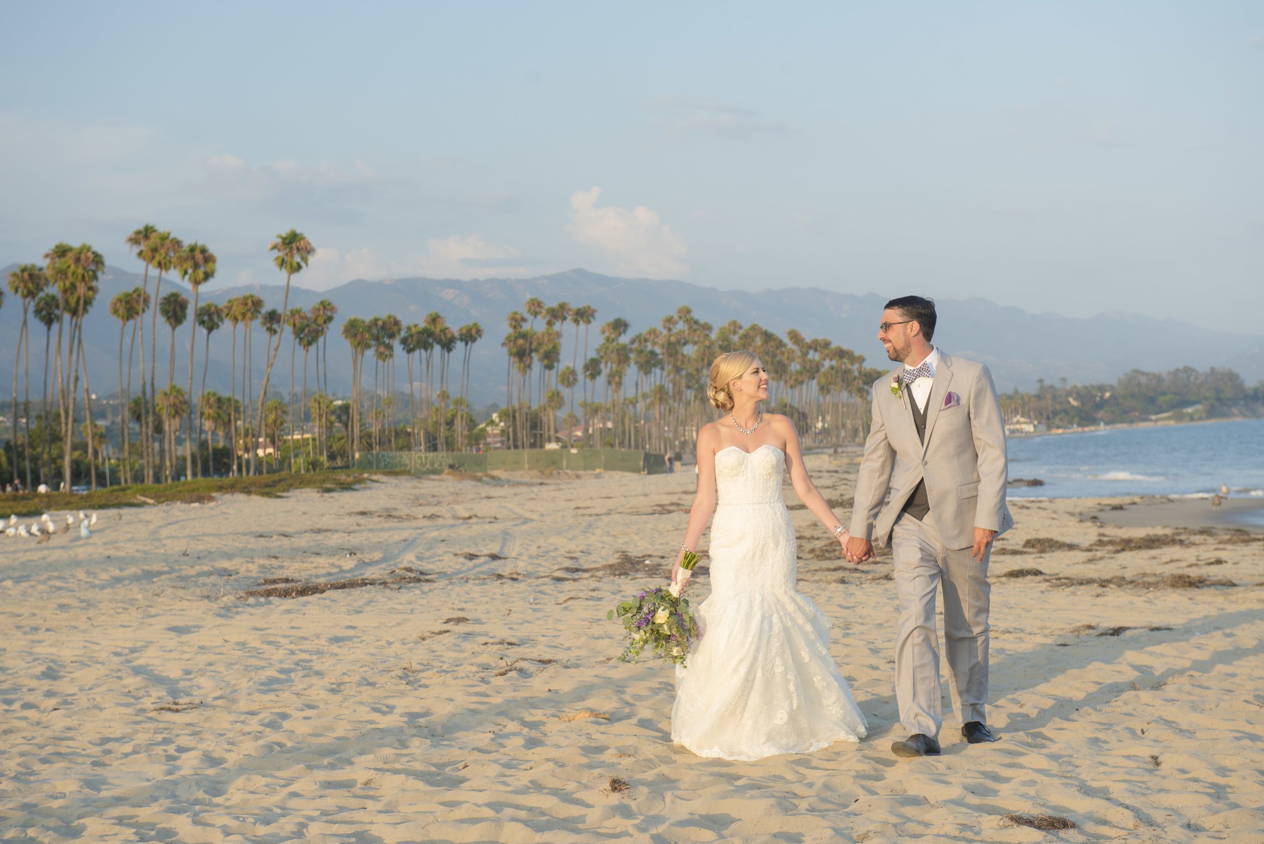 www.santabarbarawedding.com | Chase Palm Park | ByCherry Photography | Couple Walking On The Beach