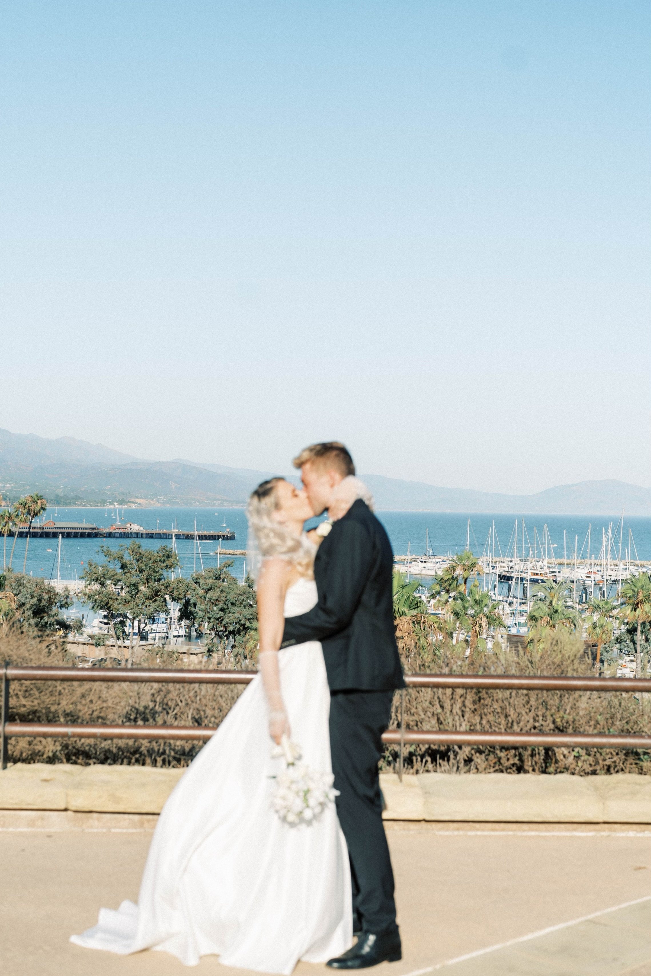 www.santabarbarawedding.com | Santa Barbara City College | Winslow Maxwell Overlook | Parker Strehlow | Michael Ambrozewicz | Nora Ambrozewicz | Couple Kissing with Ocean Views