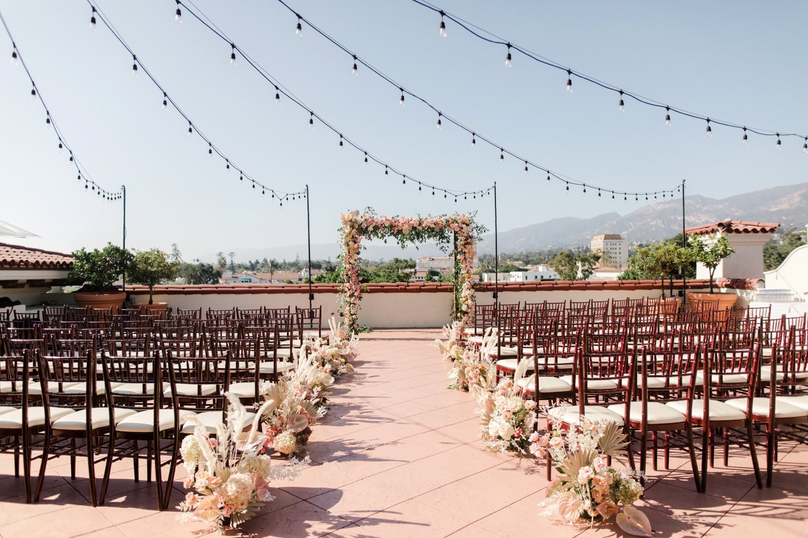 www.santabarbarawedding.com | Kimpton Canary Hotel | Anna Delores Photography | Ceremony Set Up with Panoramic Views and String Lights Overhead