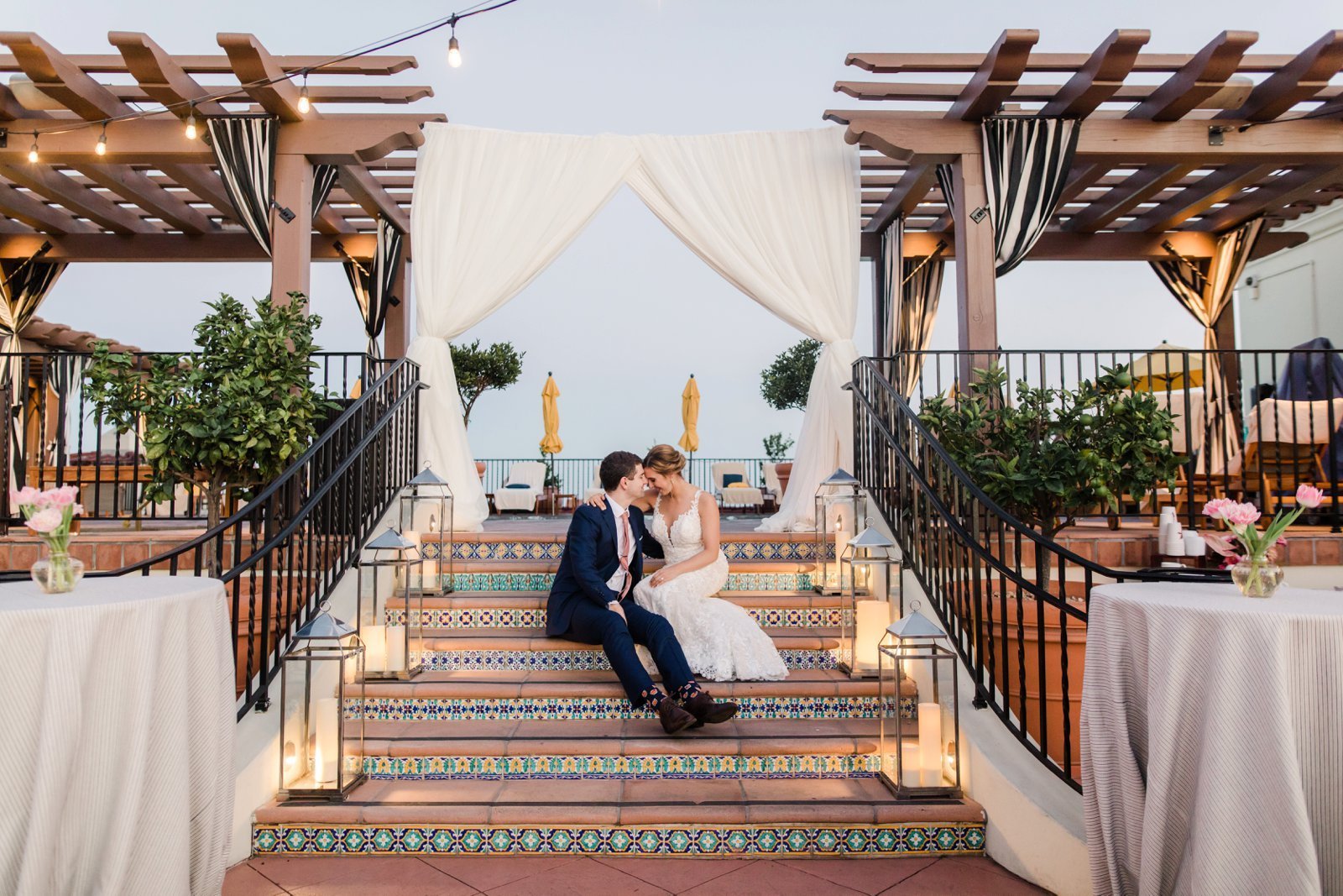 www.santabarbarawedding.com | Kimpton Canary Hotel | Anna Delores Photography | Couple Sitting on Tiled Steps by the Pool