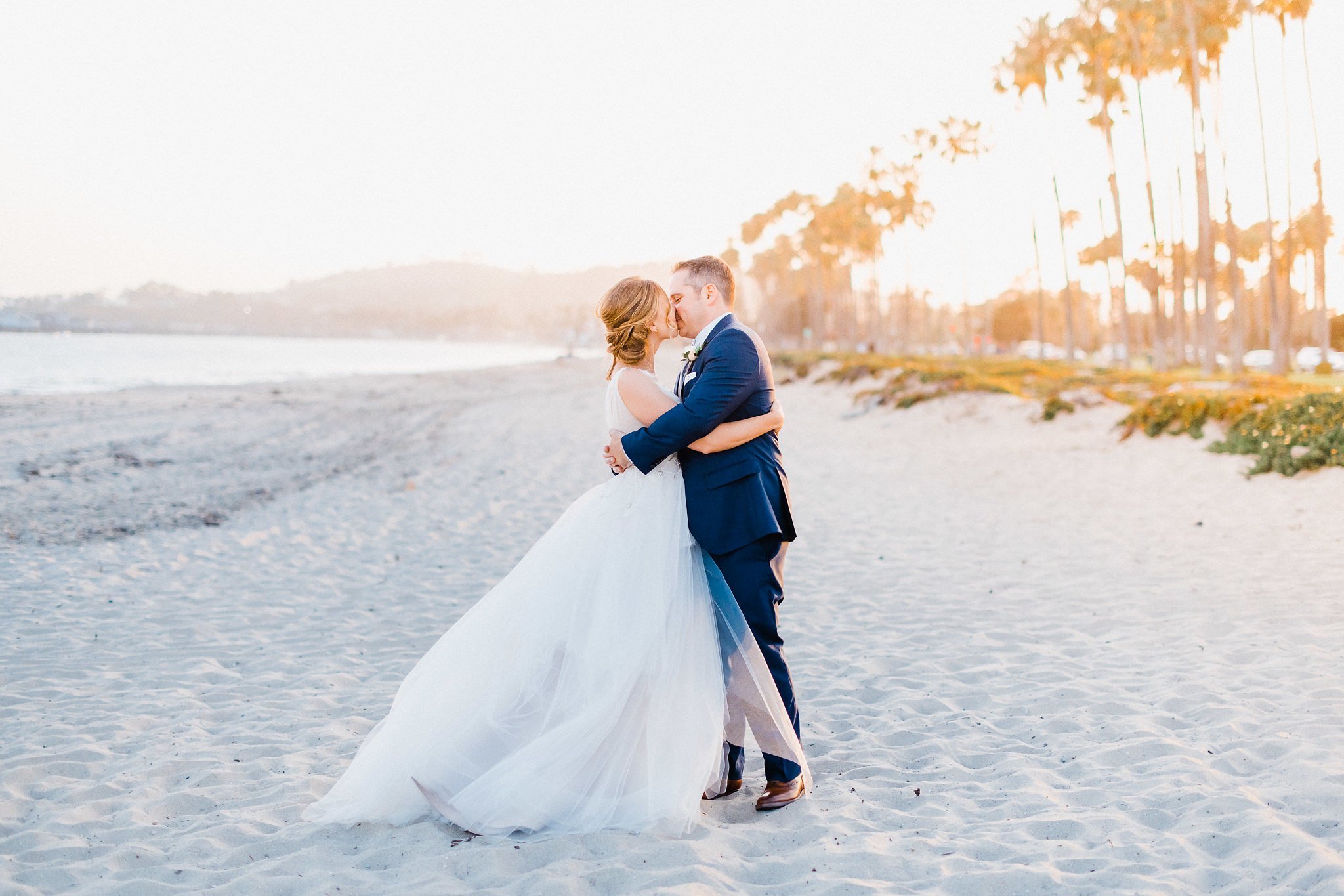 www.santabarbarawedding.com | Hilton Santa Barbara Beachfront Resort | Grace Kathryn Photography | Couple Kissing on the Beach