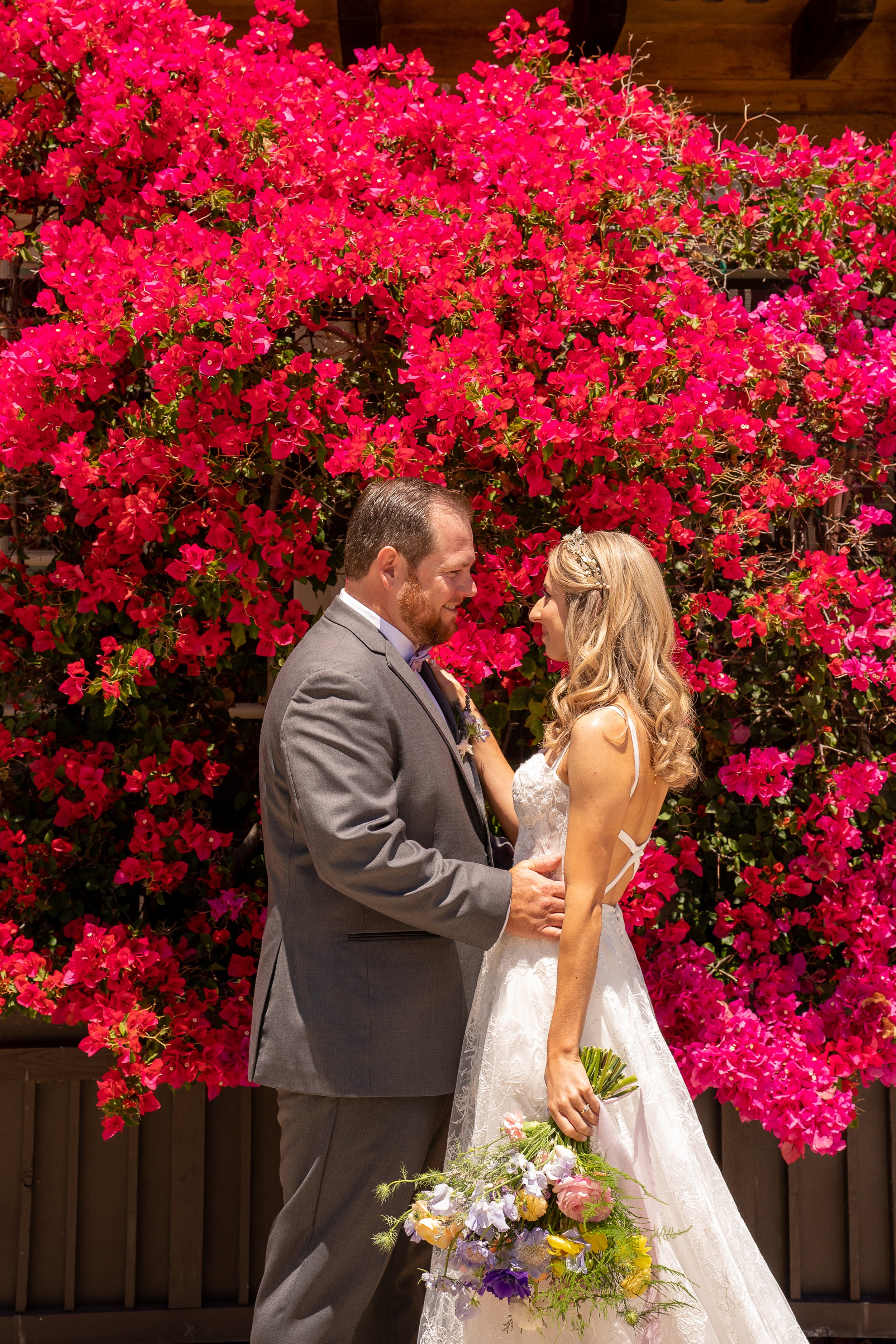 www.santabarbarawedding.com | Santa Barbara Club | Jensen Sutta | Julie Steele | Breanna Jane Botanicals | Tomiko Taft | Breanna Wilcox | Bride and Groom in Front of Pink Flower Wall