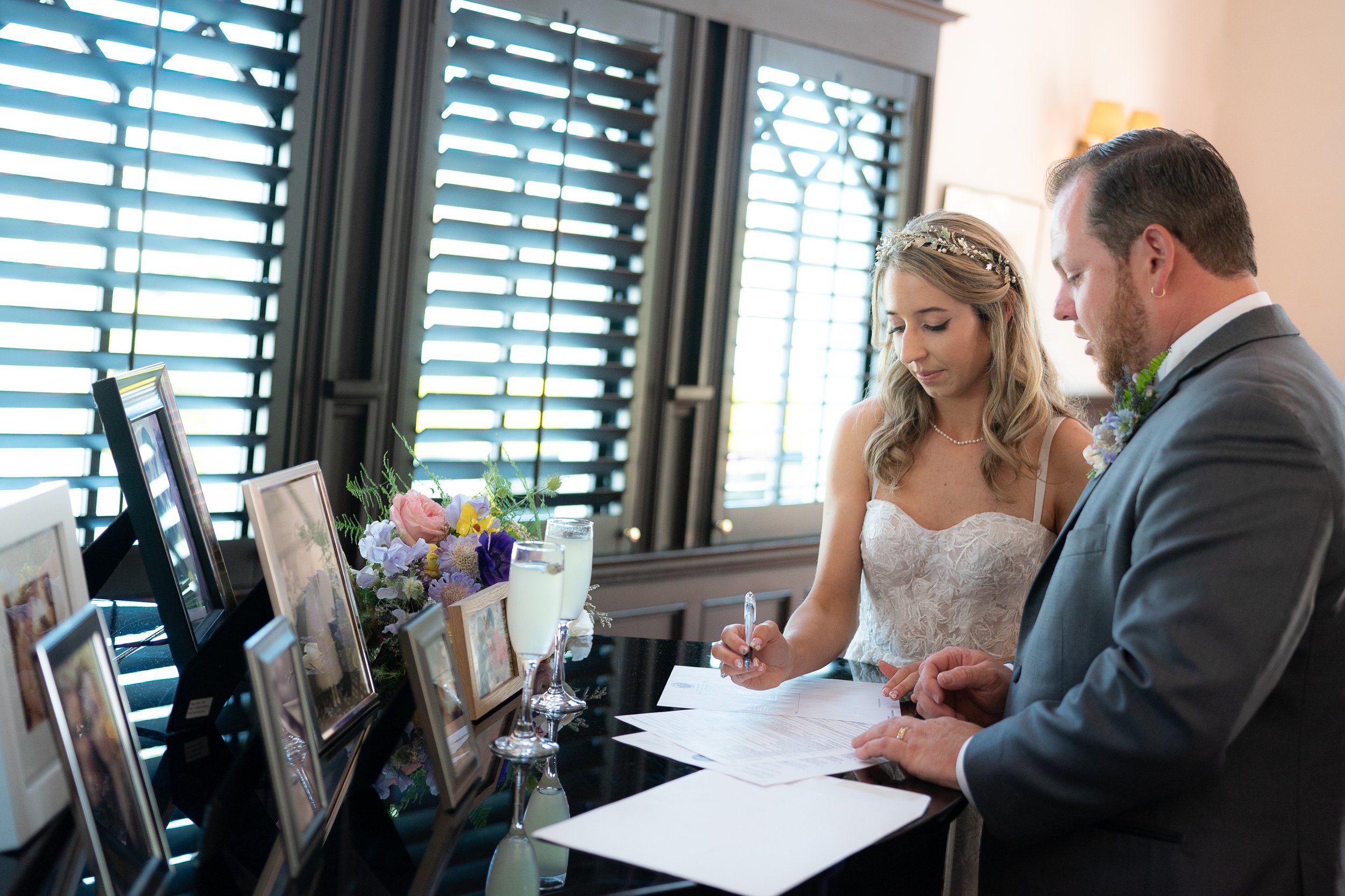 www.santabarbarawedding.com | Santa Barbara Club | Jensen Sutta | Julie Steele | Breanna Jane Botanicals | Tomiko Taft | Breanna Wilcox | Bride and Groom Signing Marriage Certificate