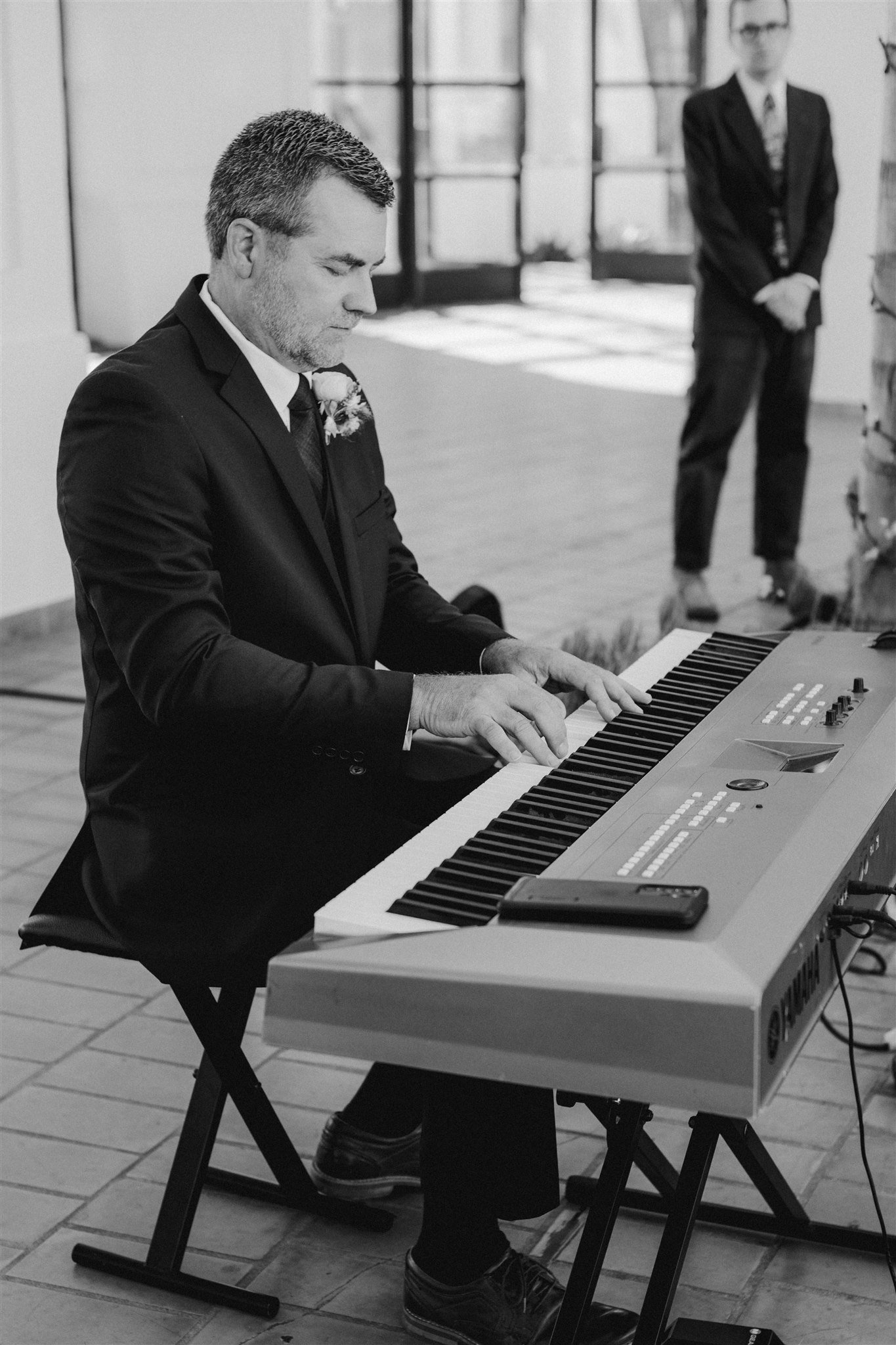 www.santabarbarawedding.com | Hilton Beachfront Resort | LuckEleven Events | Brocoff Photography | Once Upon A Florist | Amigo Party Rentals | Groom’s Father Playing Piano at Ceremony