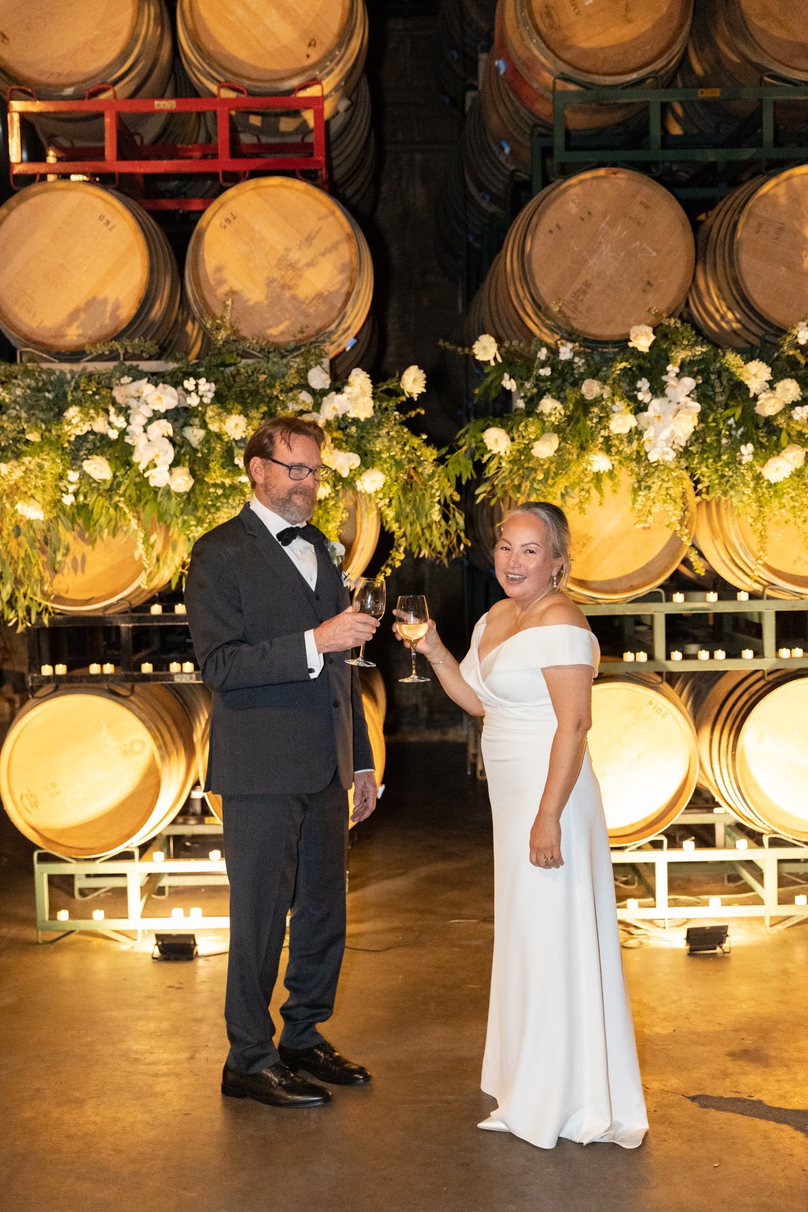 www.santabarbarawedding.com | Emily Hart-Roberts | Carr Winery | Felici Events | Ella &amp; Louie | Rogue Styling | Couple Sharing Glass of Wine
