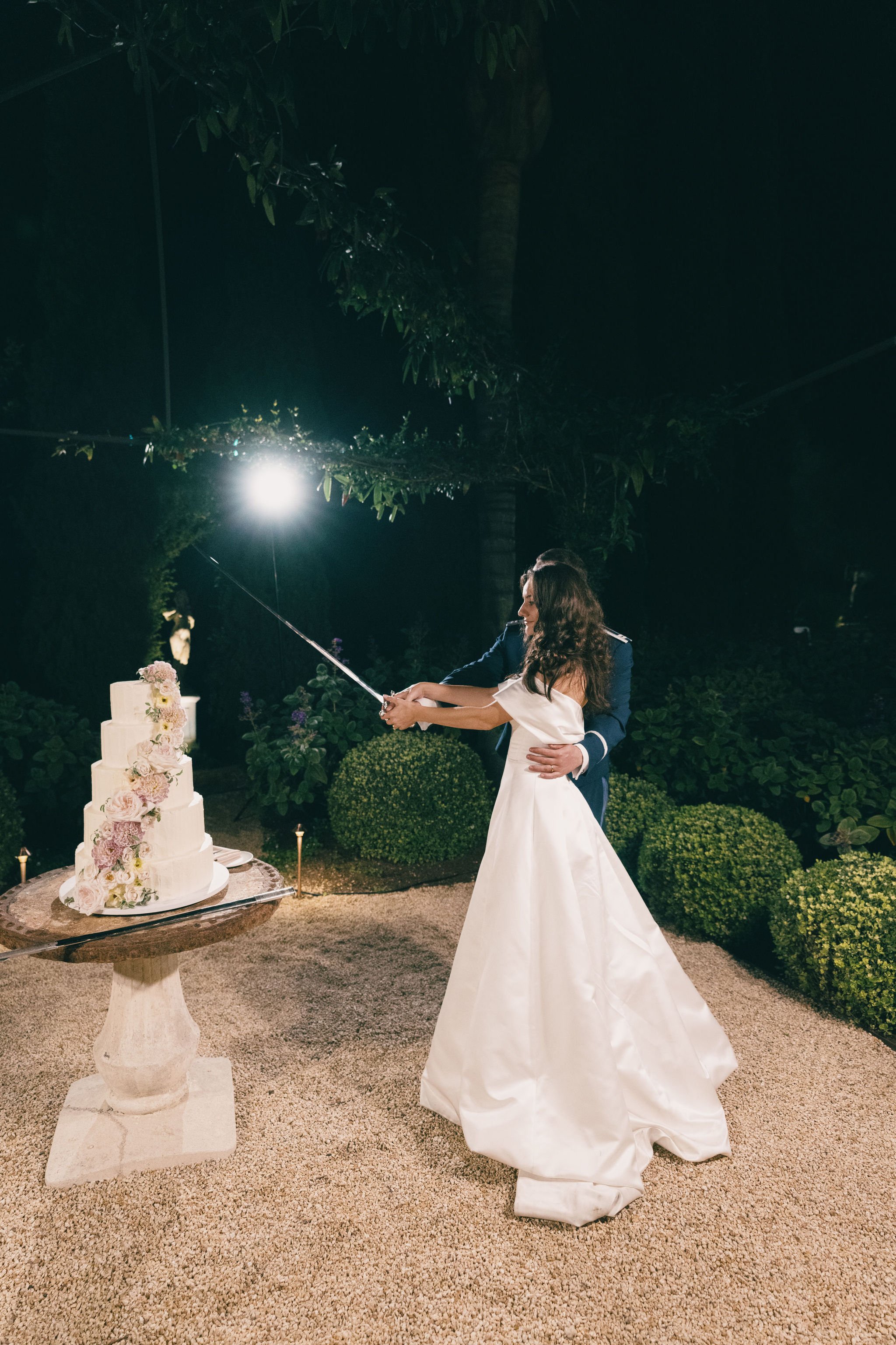 www.santabarbarawedding.com | Kurt Boomer Photography | Details, Darling | Alexis Ireland Florals | Downbeat Agency | Cake Cathedral | Couple Cutting the Wedding Cake