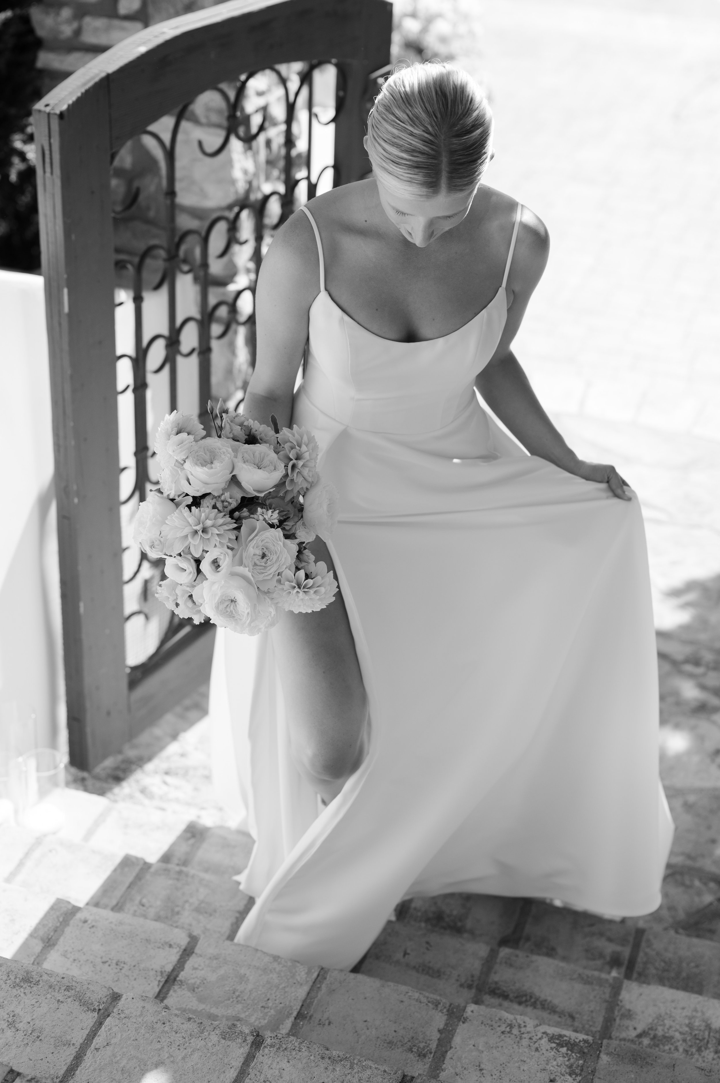 www.santabarbarawedding.com | Tonya Szele | Haley Garces | Tuscan Hills | Ella &amp; Louie | Carlyle Salon | Bride Walking Up Stairs with Bouquet