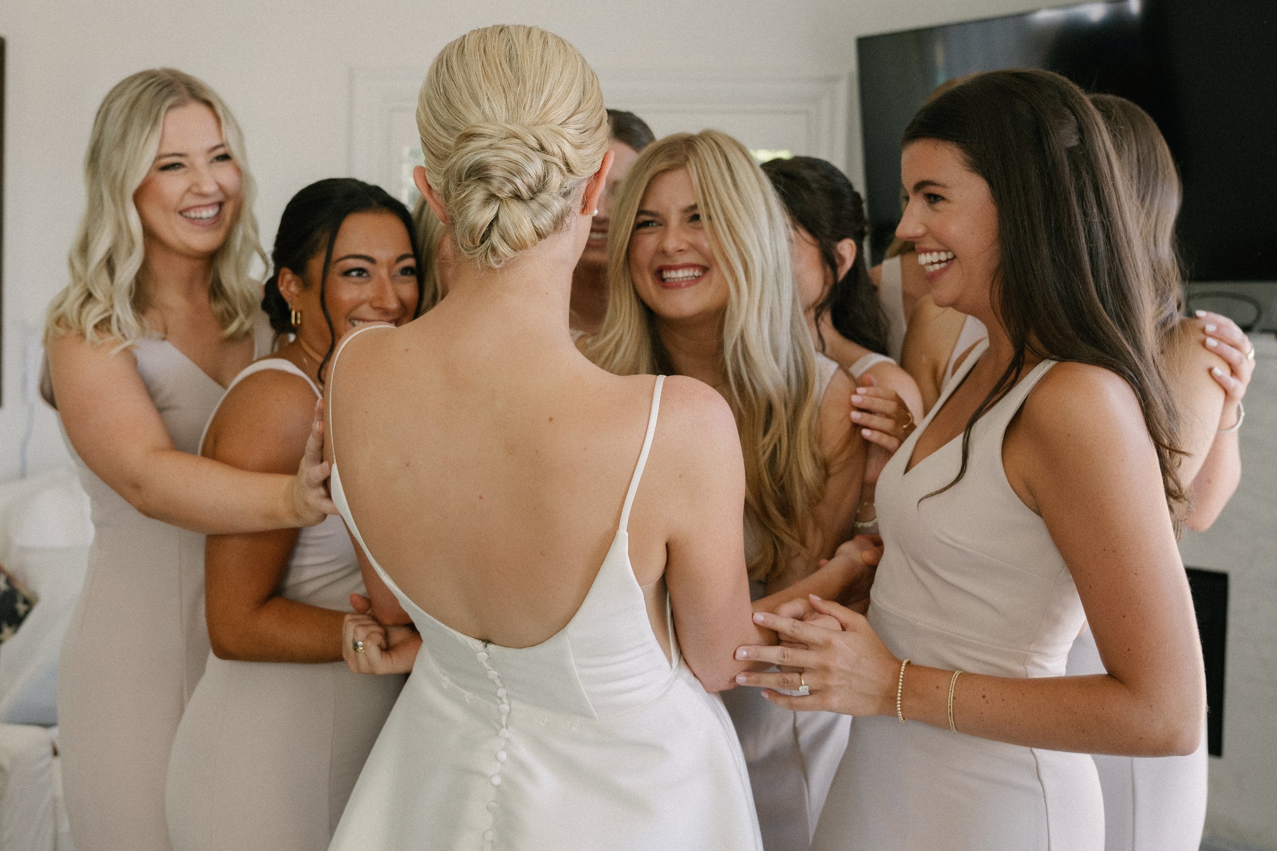 www.santabarbarawedding.com | Tonya Szele | Haley Garces | Tuscan Hills | Ella &amp; Louie | Carlyle Salon | Bride Hugging Bridesmaids
