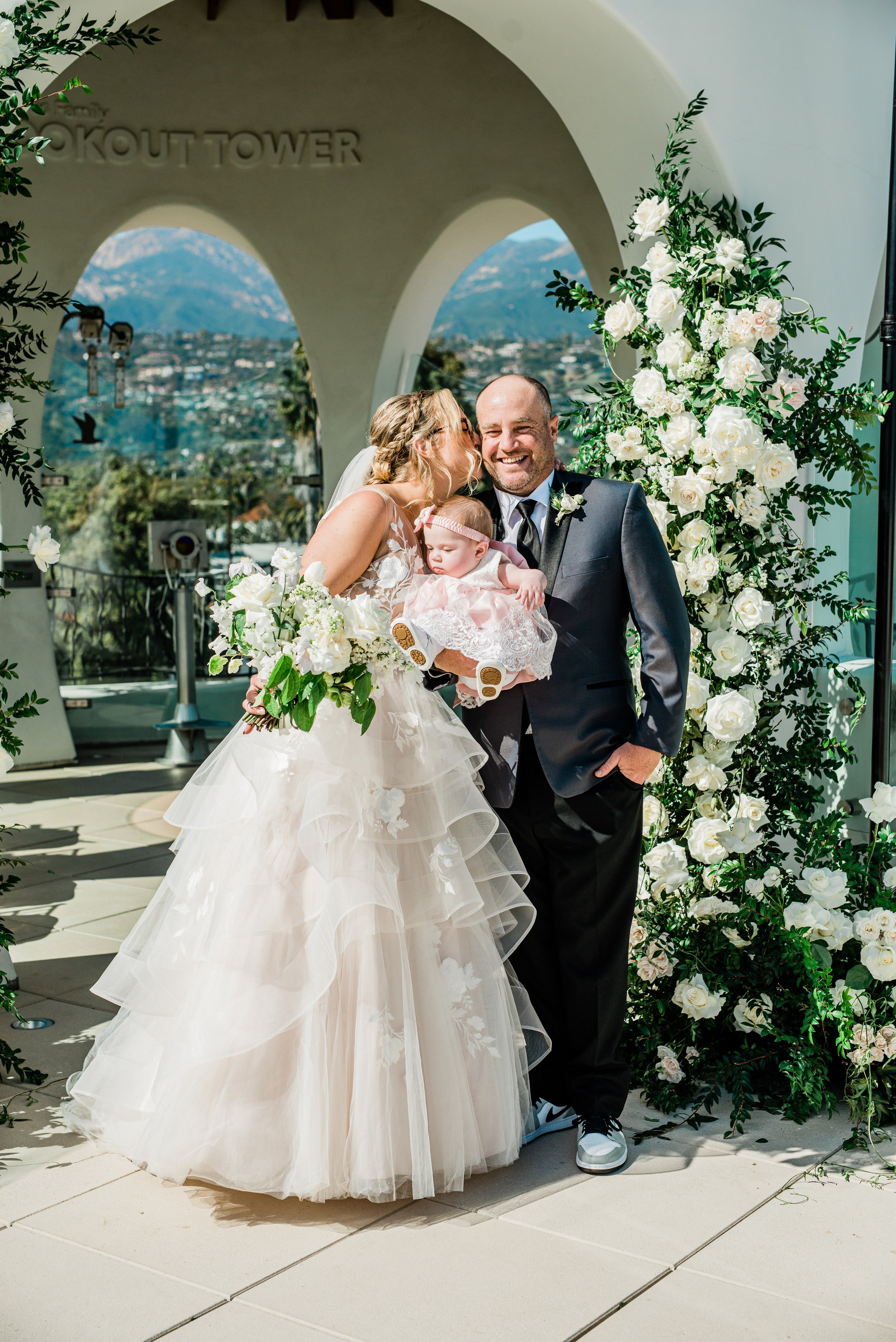 www.santabarbarawedding.com | Leana Myra | The MOXI | Drake Social | Blooms of Santa Barbara | Dreamcatcher Artistry | Couple with Their Daughter at Ceremony