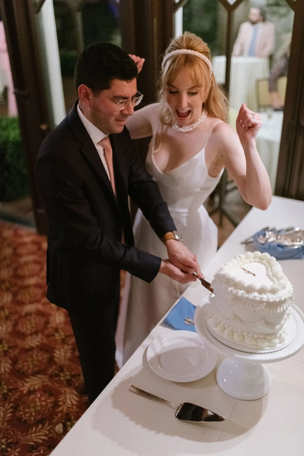 www.santabarbarawedding.com | Gatherings for Good | Santa Barbara Club | Lena Britt | Claire Hartnell | Moonglow Floral | Ms. Updo | Shanie Crosbie | Lele Patisserie | Couple Cutting the Cake