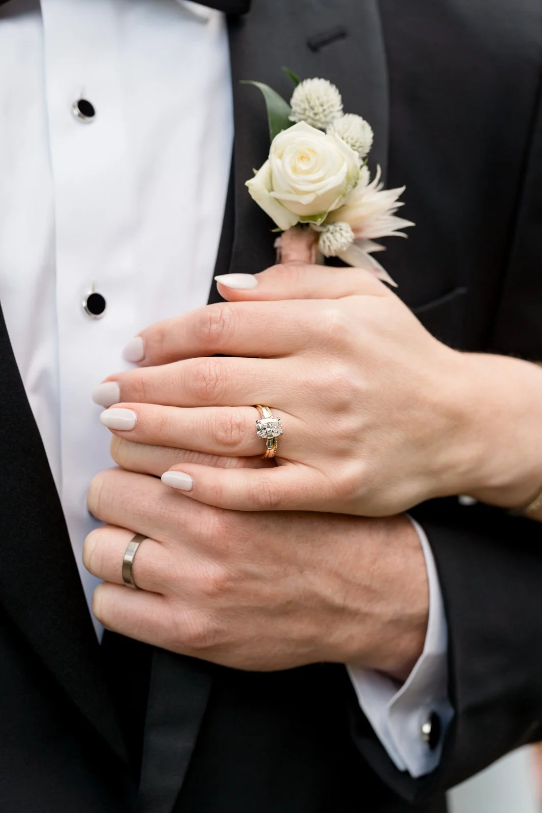 www.santabarbarawedding.com | Events by Fran | Eli Suzuki-Gill | Santa Barbara Courthouse | Blue Blossoms | Just 4 Fun Party Rentals | Party Proper | Close Up of Couple's Rings