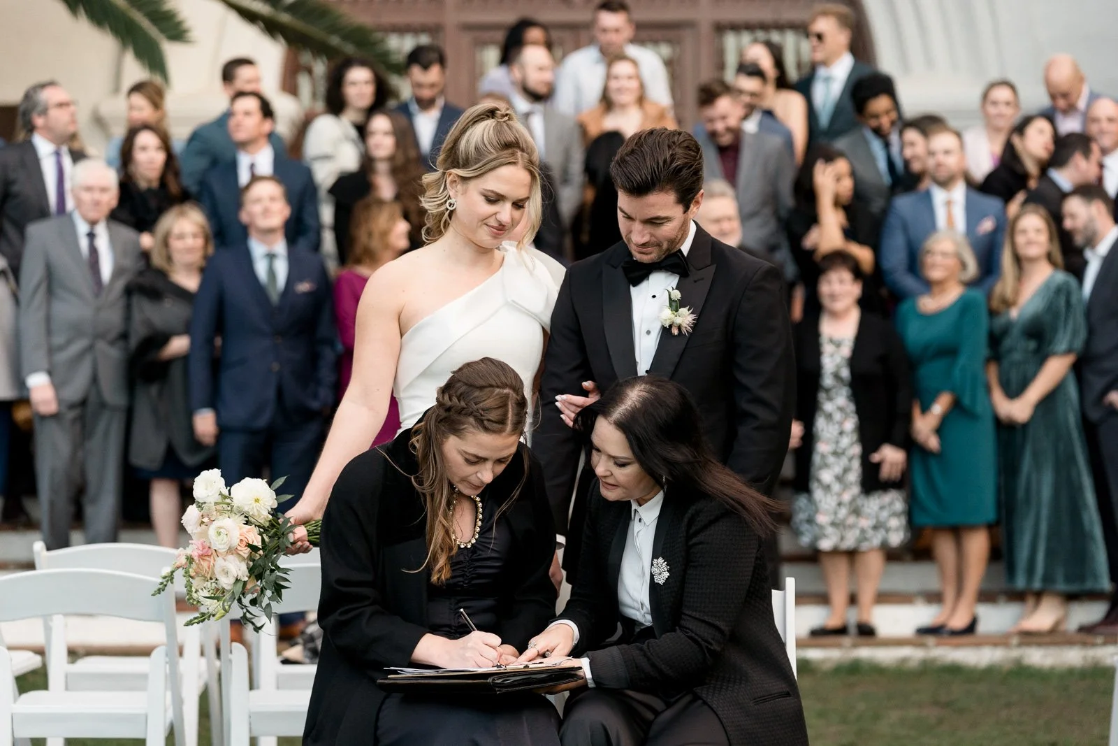 www.santabarbarawedding.com | Events by Fran | Eli Suzuki-Gill | Santa Barbara Courthouse | Blue Blossoms | Just 4 Fun Party Rentals | Party Proper | Signing Marriage Certificate