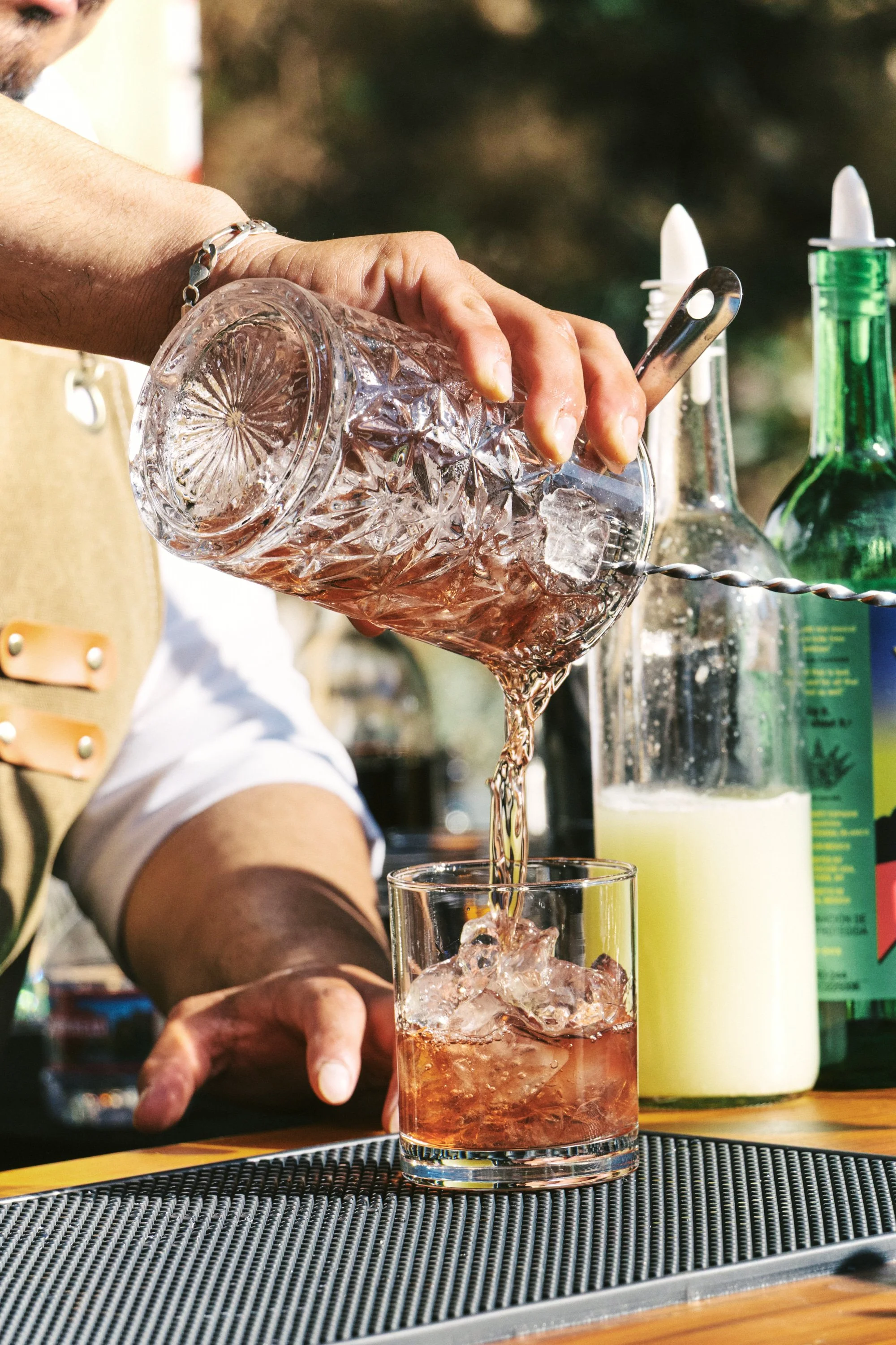 www.santabarbarawedding.com | Zaca Lake | Laine Palm Planning | Alanna Durkee | Brophy Blooms | SYV Elite Events |  Bartender Pouring Drinks