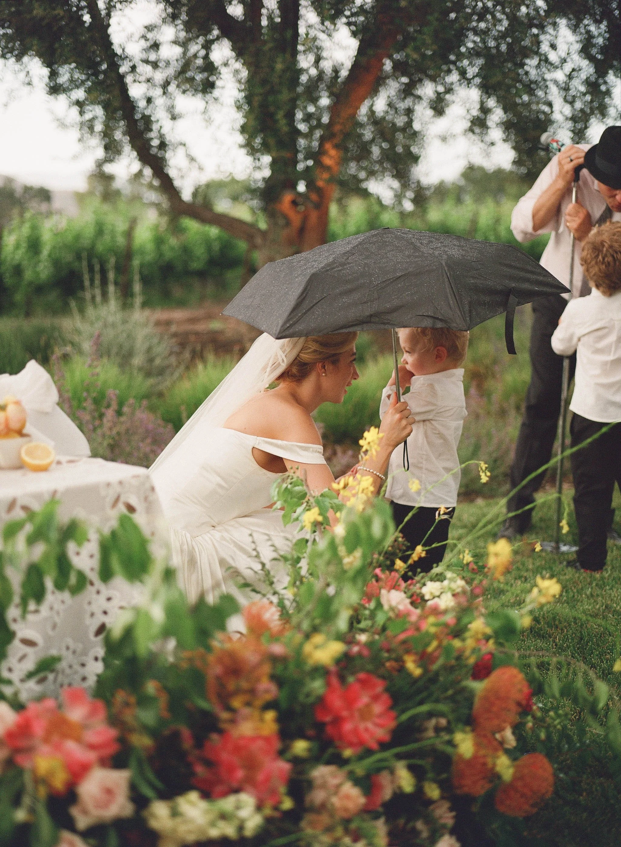 www.santabarbarawedding.com | Bliss Productions | Breahna Taylor | La Taranntella | Bright Floral | Town and Country Event Rentals | BBJ La Tavola | Bride Under Umbrella