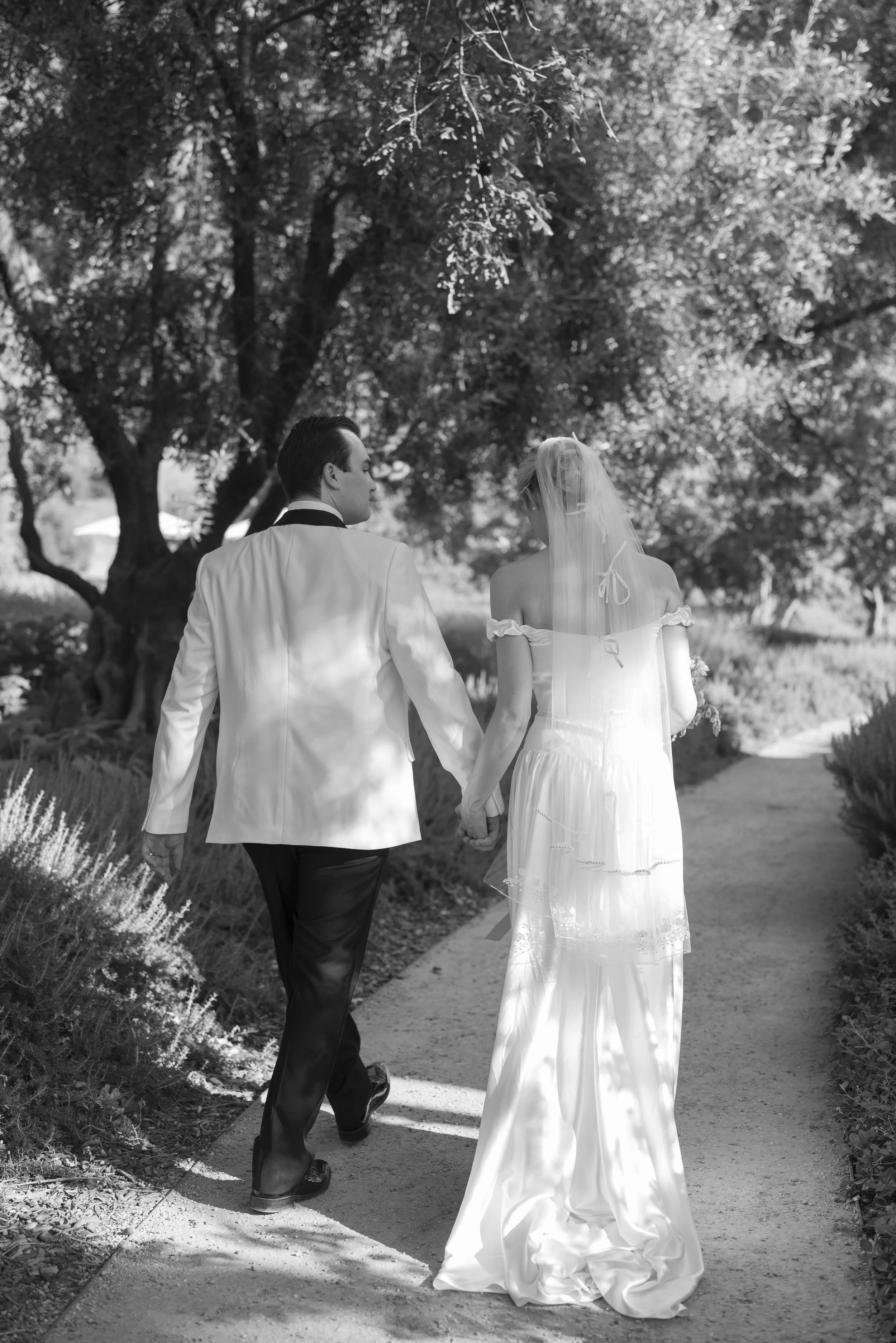 www.santabarbarawedding.com | Bliss Productions | Breahna Taylor | La Taranntella | Bright Floral | Marla Hair &amp; Makeup | Town and Country Event Rentals | Couple Leaving the Ceremony
