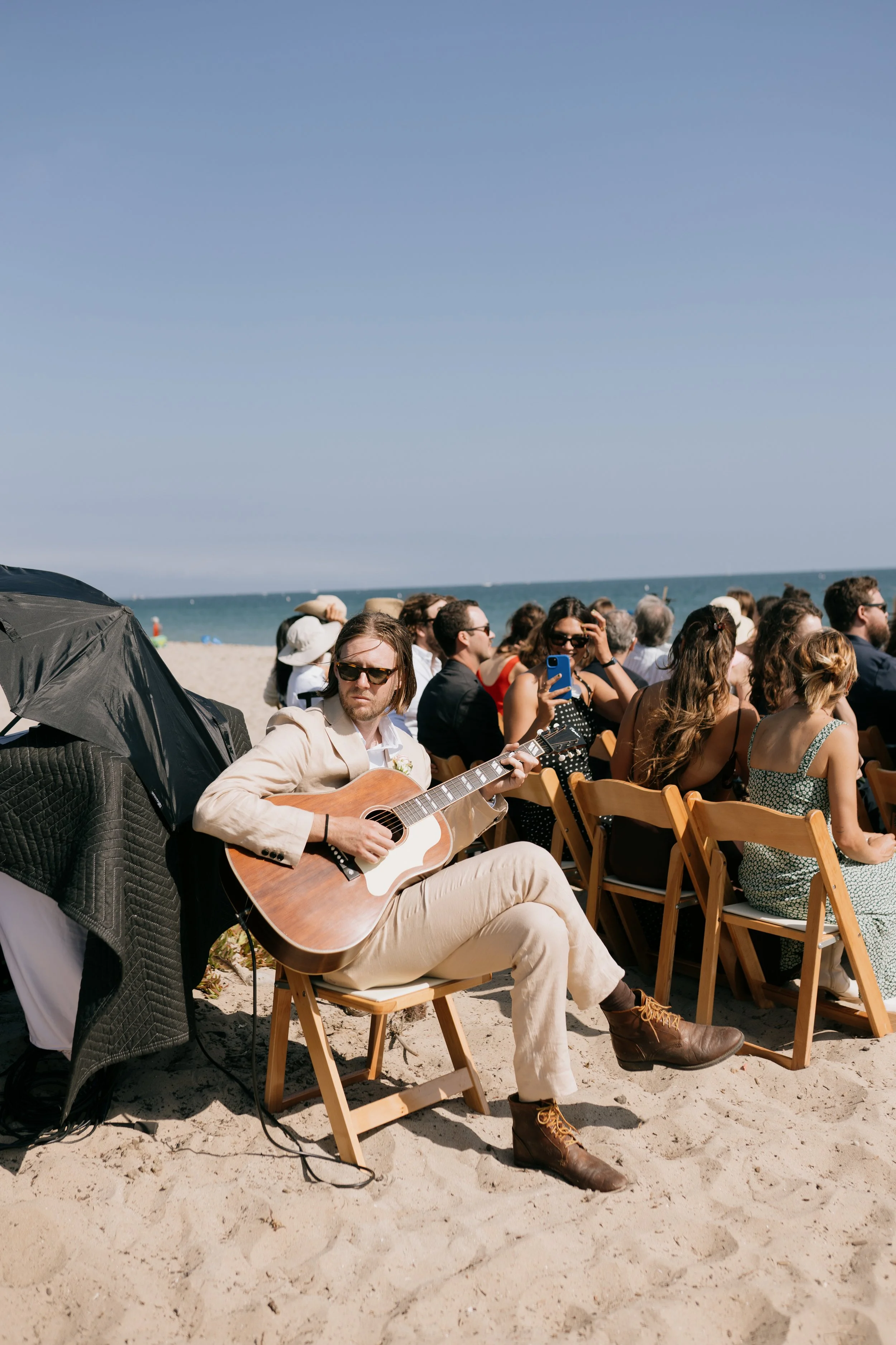 www.santabarbarawedding.com | Bae Events | Danya Izarraraz | Anthology Studios | Backdrop Boutique | Beach Ceremony Set Up and Guitarist