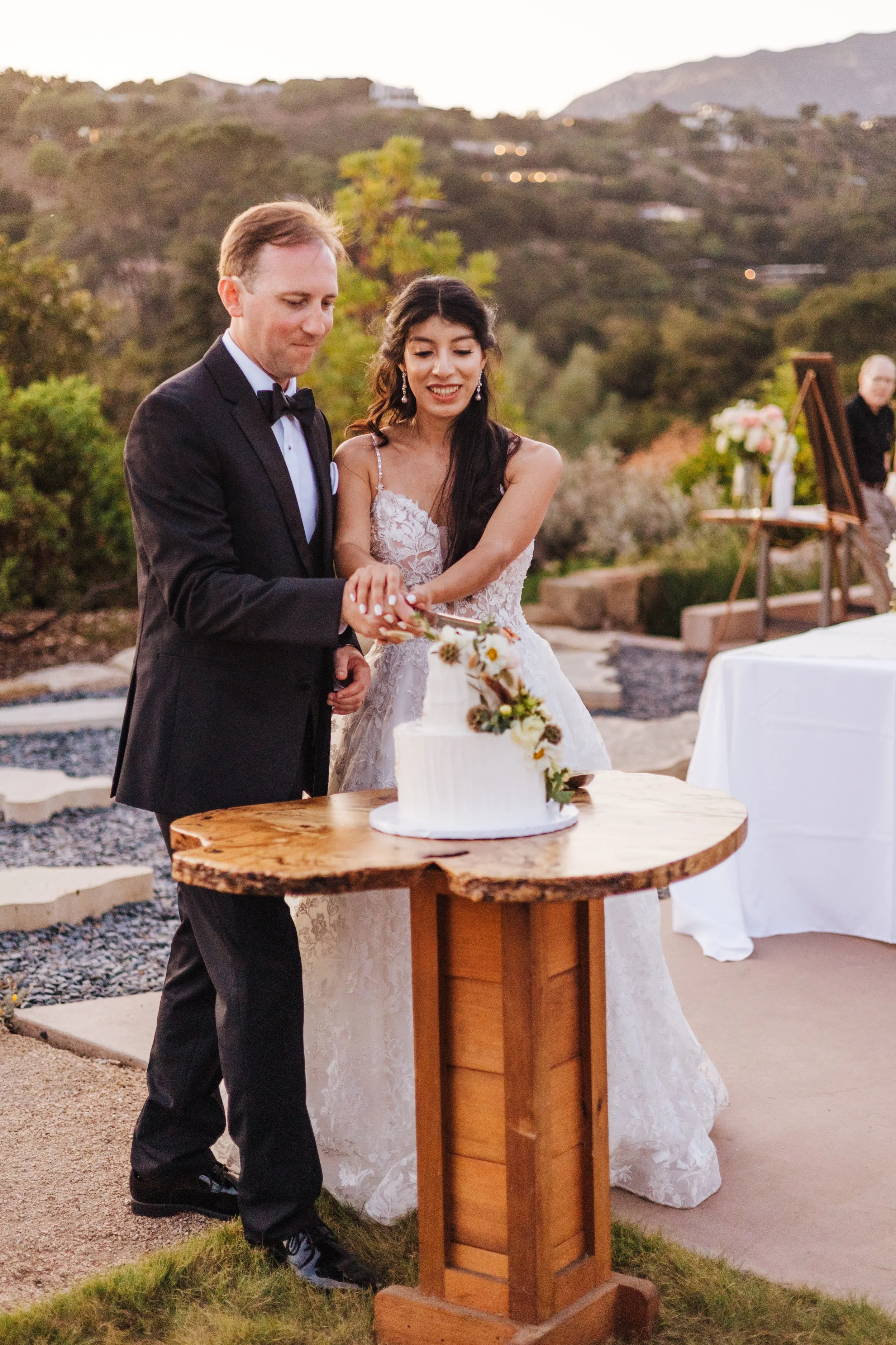 www.santabarbarawedding.com | Allie Dearie | Lucky Penny Events | Santa Barbara Botanic Garden | All Heart Rentals | Café Ficelle | Couple Cutting Cake