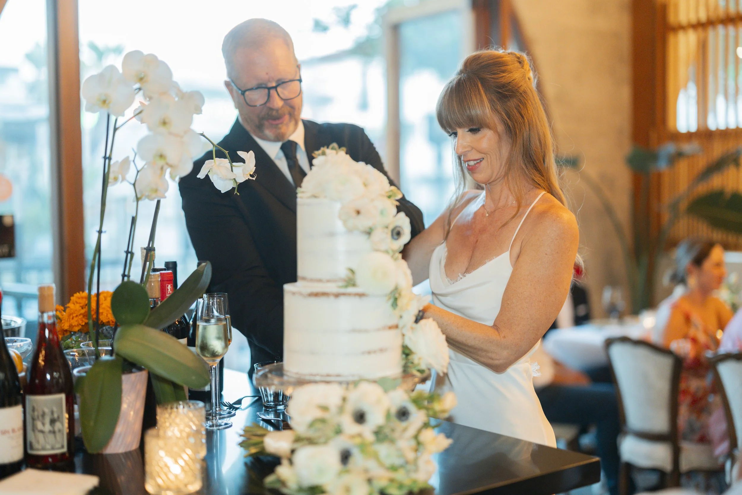 www.santabarbarawedding.com | Lauren Maeve | Gala Restaurant | Coastal Rose Events | The Twisted Twig | Amigo Event Rentals | Lele Patisserie | Marla &amp; Co. | Couple Cutting Cake