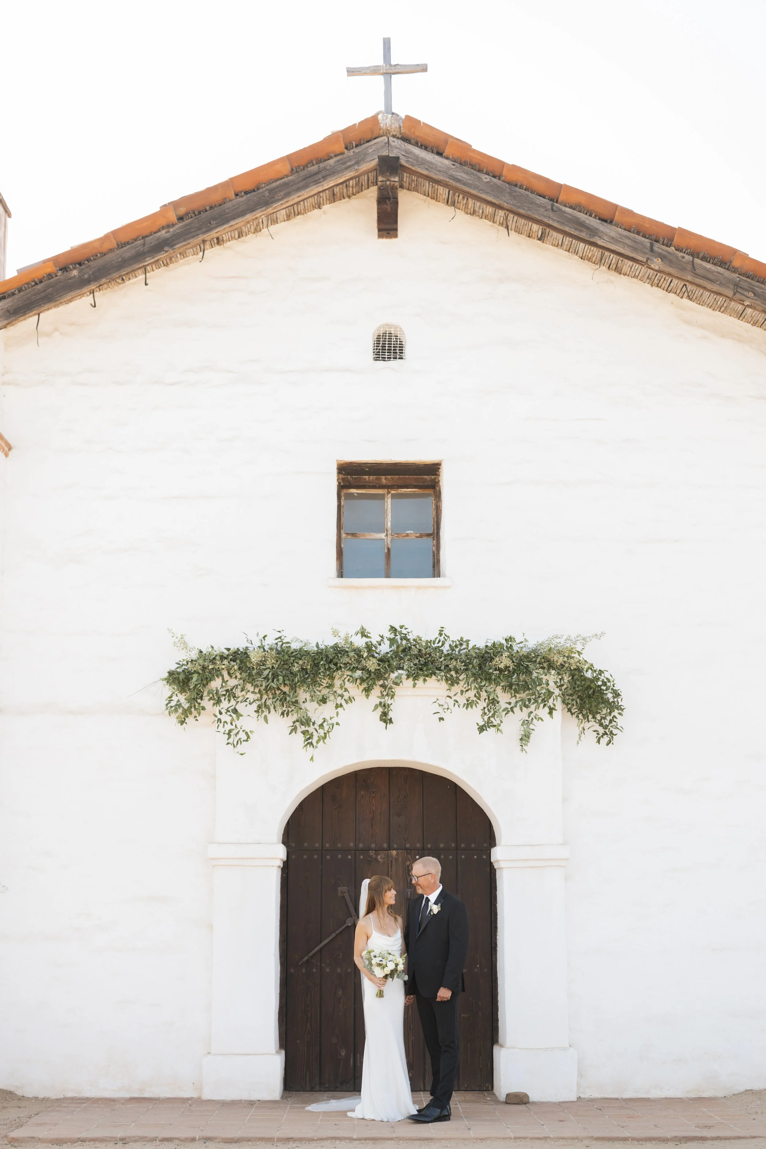 www.santabarbarawedding.com | Lauren Maeve | Presidio Chapel | Coastal Rose Events | The Twisted Twig | Marla &amp; Co. | Couple After Ceremony