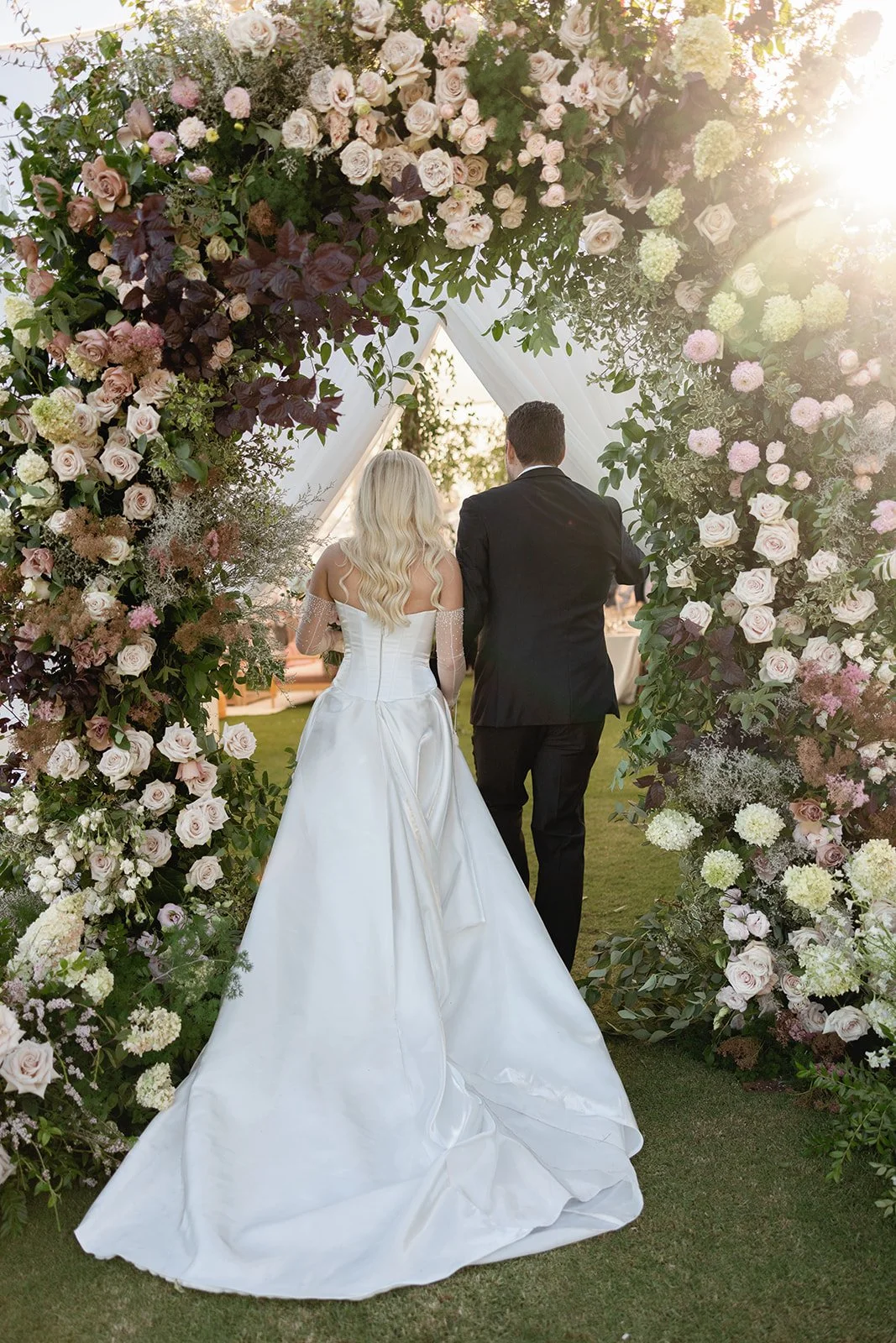 www.santabarbarawedding.com | Sposto Photography | Olive Grove Estate | weddings by Susan Dunne | Mulberry Estate | Bright Event Rentals | Couple Entering Reception