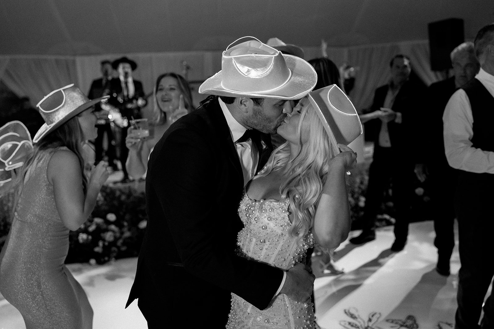 www.santabarbarawedding.com | Sposto Photography | Olive Grove Estate | weddings by Susan Dunne | Mulberry Estate | Bright Event Rentals | Couple Dancing at Night with Cowboy Hats On