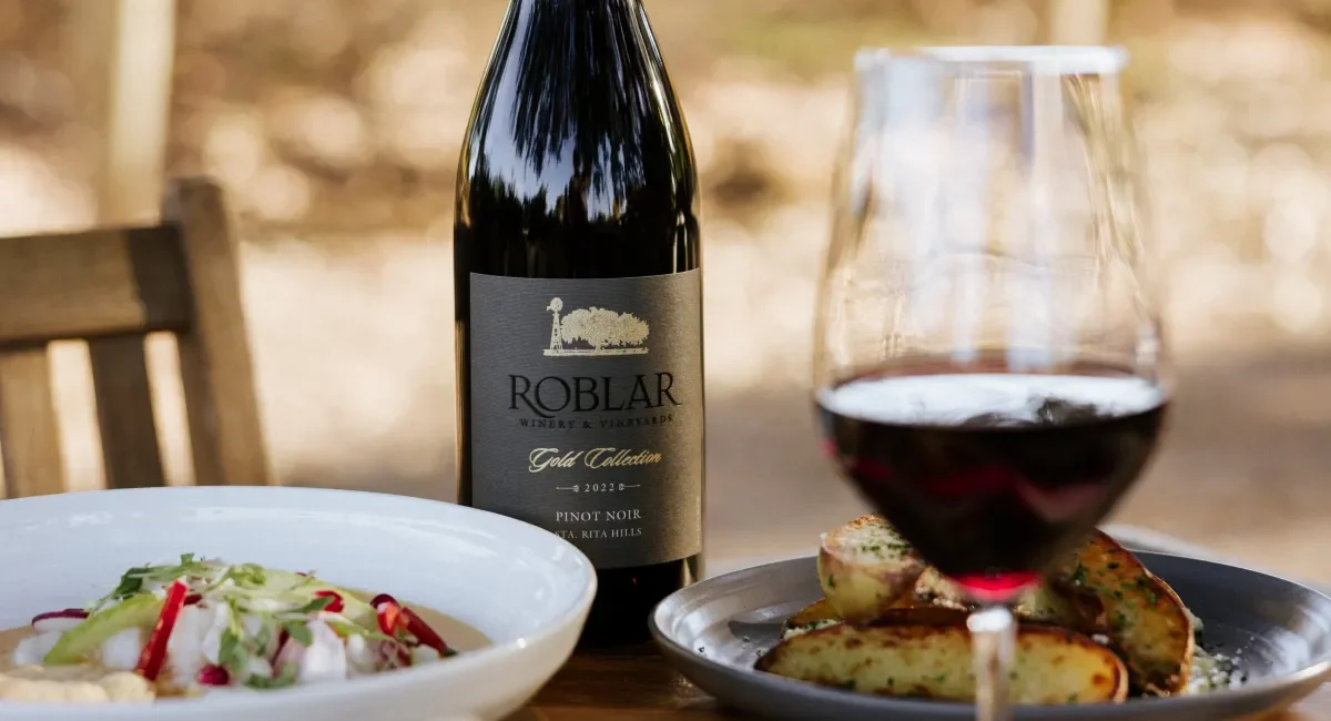 Roblar Winery glass and bottle of red wine