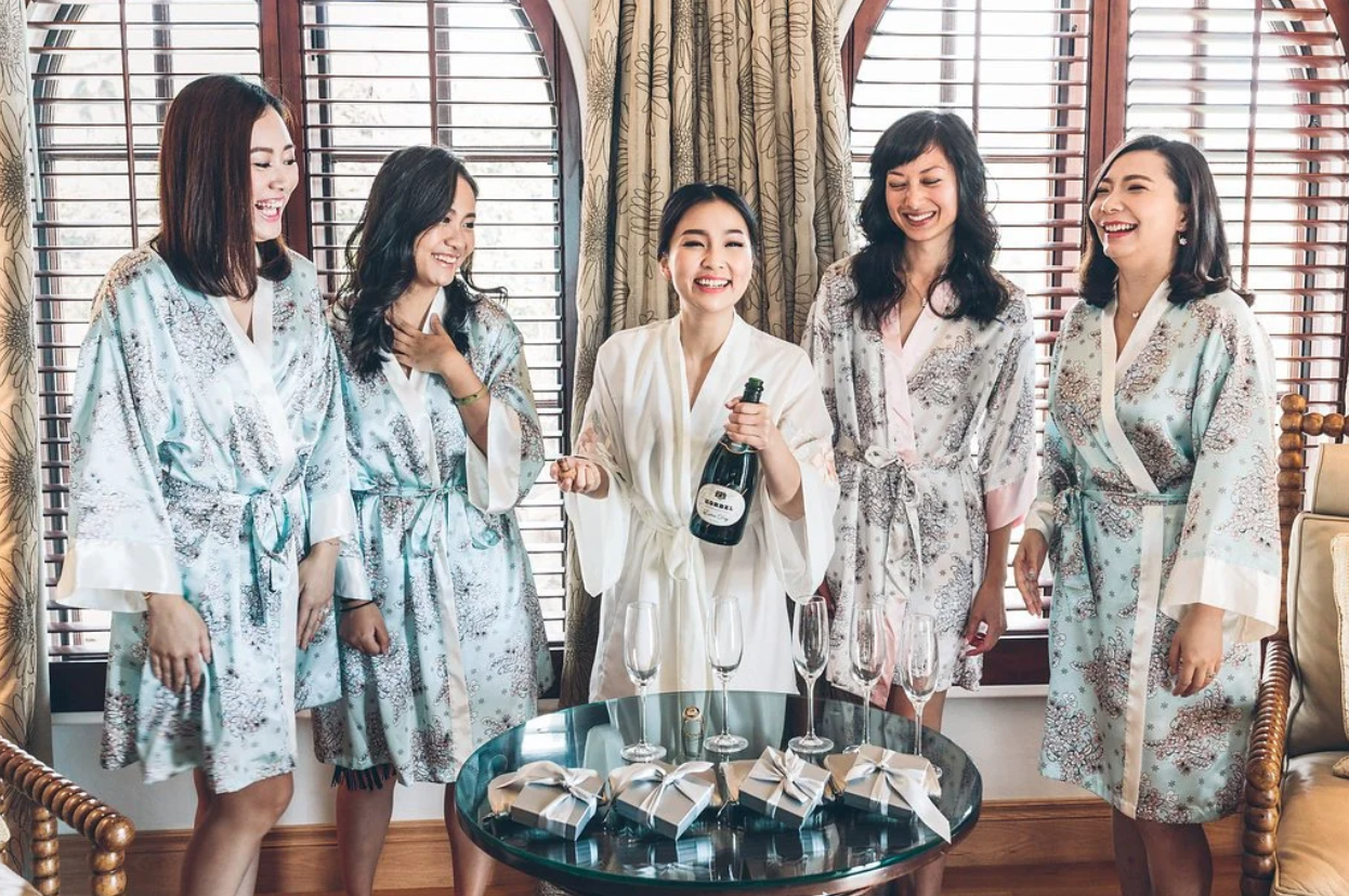 Bride and bridesmaids in floral robes