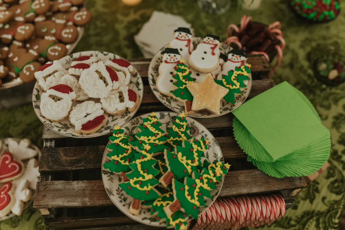 Dessert table full of Christmas cookies