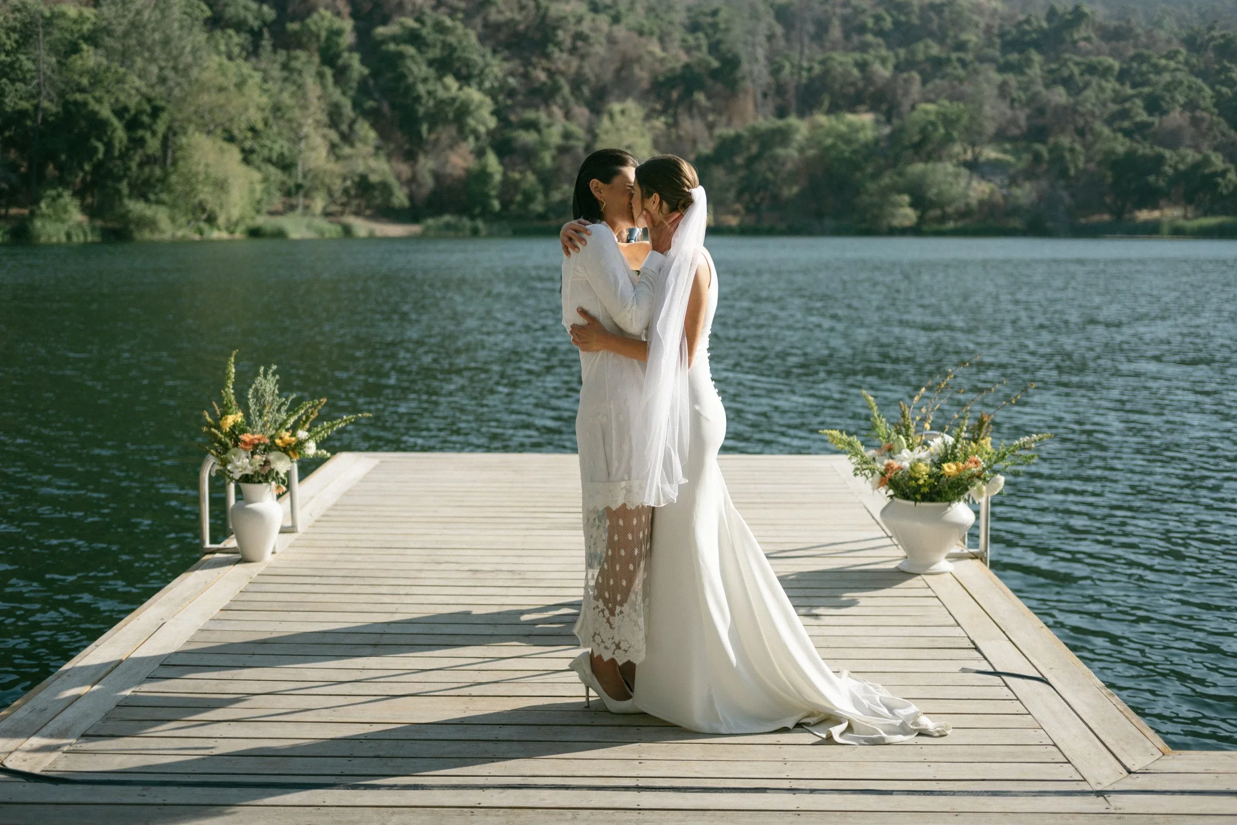 Brides kiss at Zaca Creek wedding ceremony