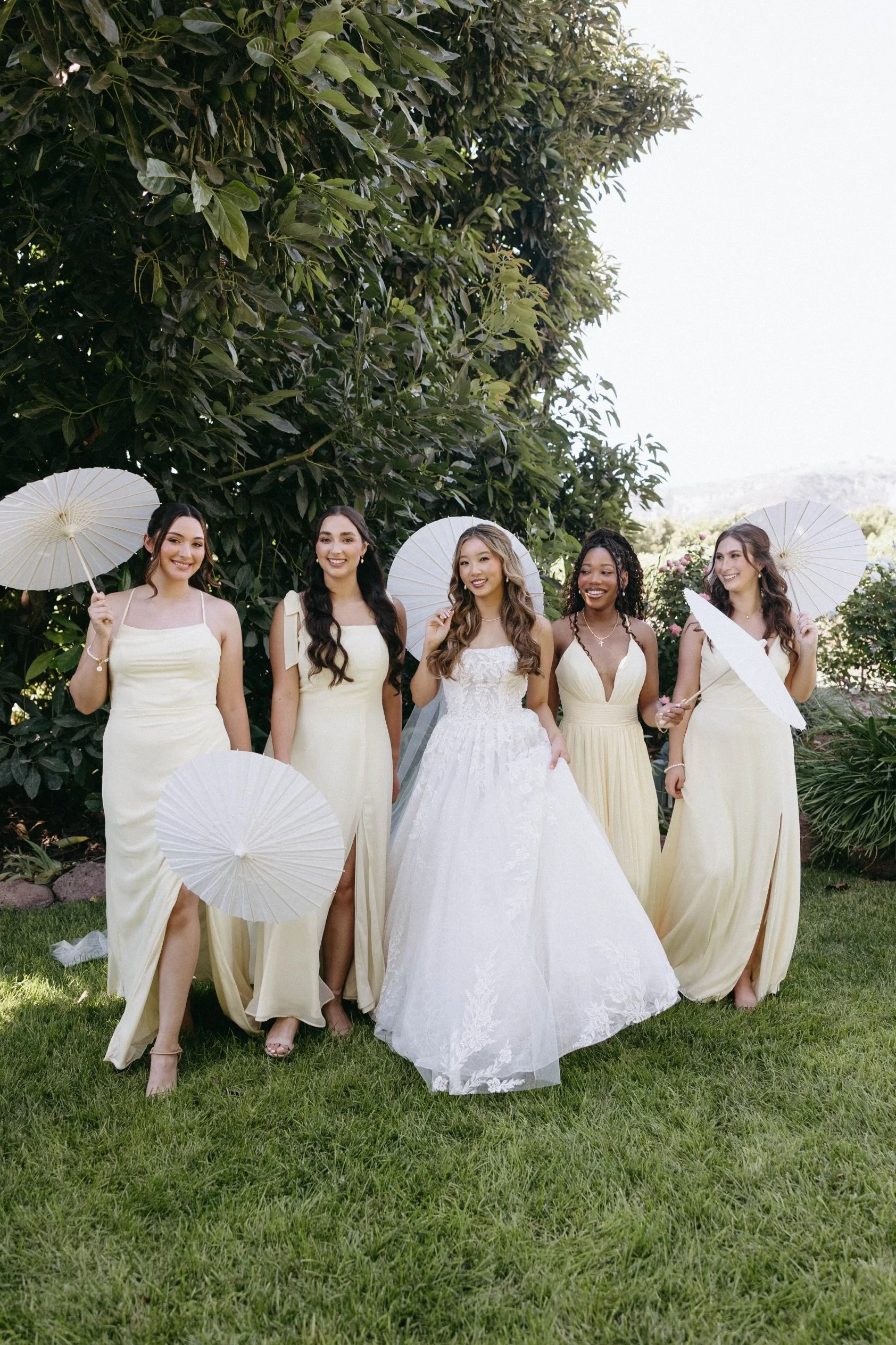 Bride and Bridesmaids with Umbrella