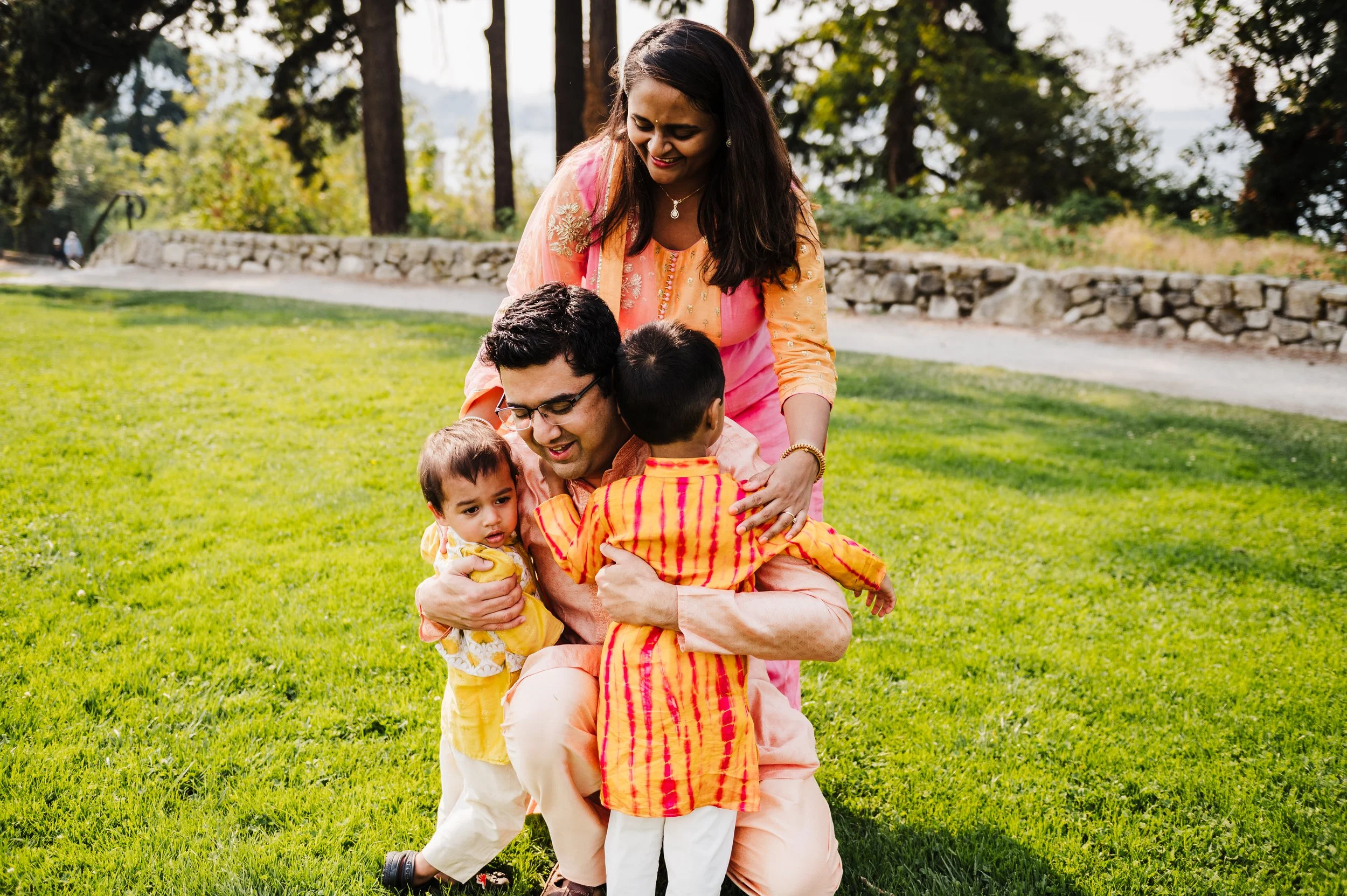 Indian family photos in Kirkland with bright colors and warm hugs