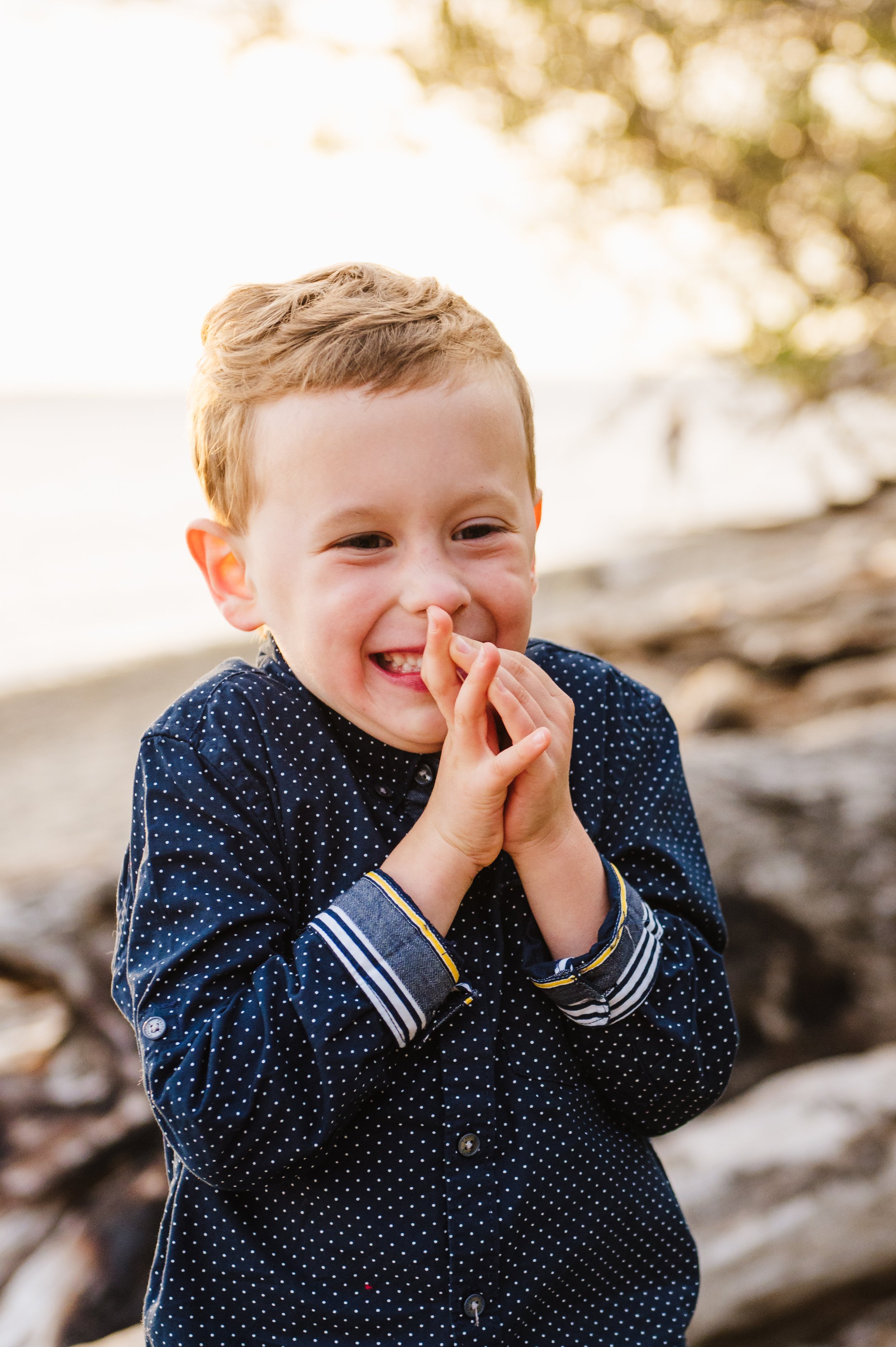 Son at the beach for family photos in Shoreline