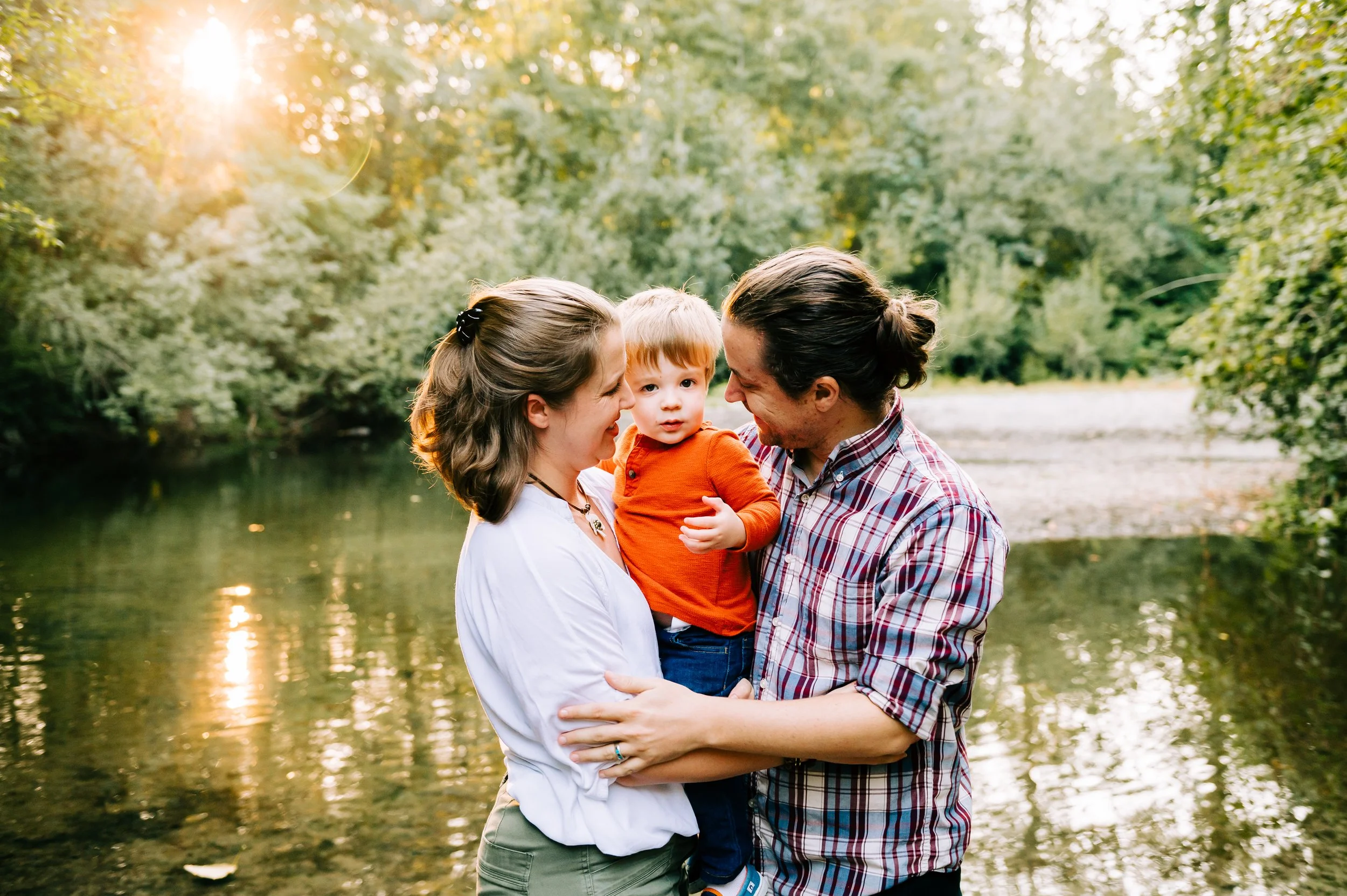 Kenmore park with family of three at family photos near Seattle