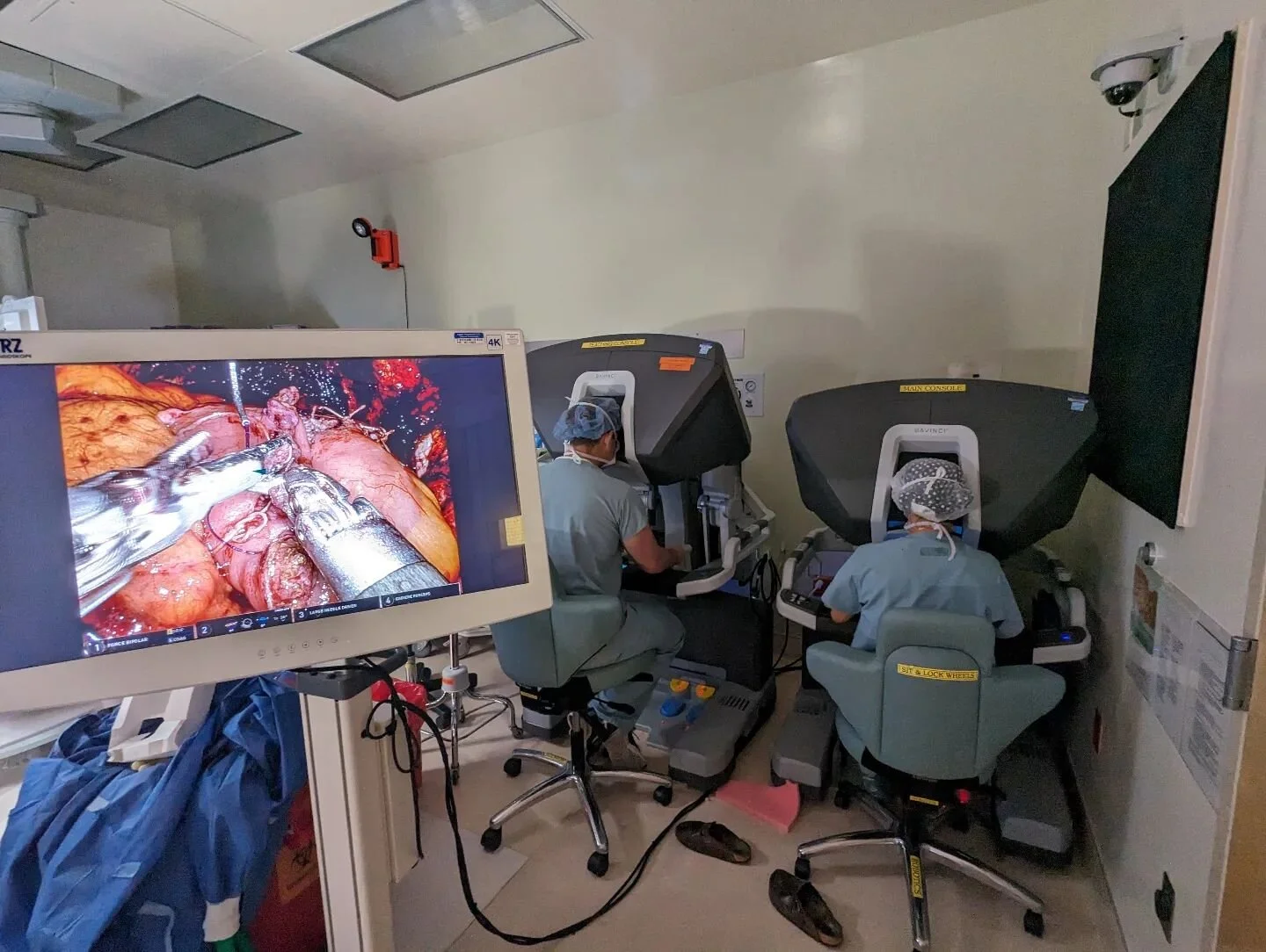 On Tuesdays we robot. Shoes optional.
Here's a little peak at Trevor (R6) walking Arriana (R3) through robotic suturing during a prostatectomy. 
Fun fact: they are the strongest residents in our program 
#kaiser #davinci #prostate #noshoes