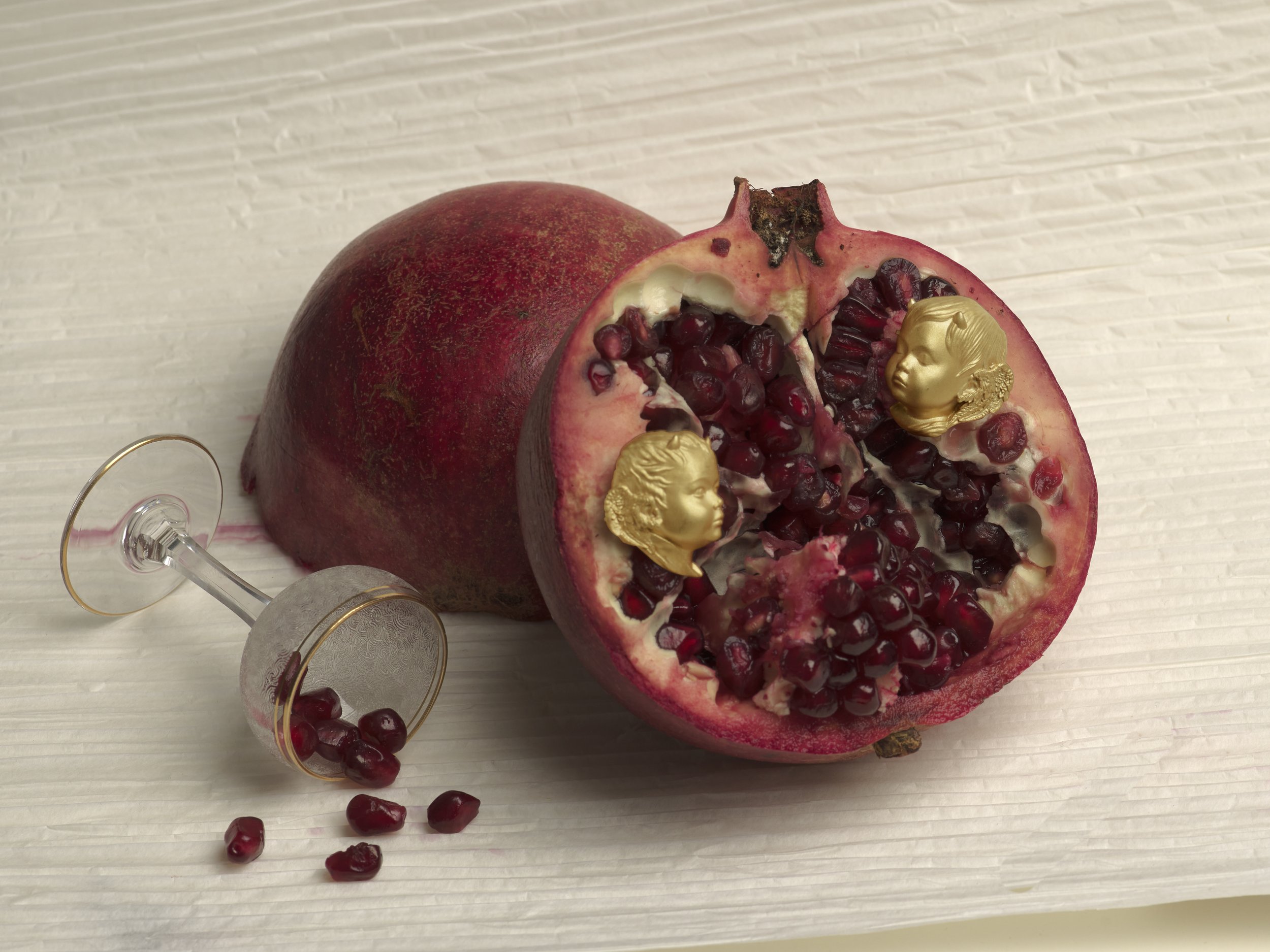 Authorne campaign jewelry photography by Little Wolf Collective — rings nestled in pomegranate