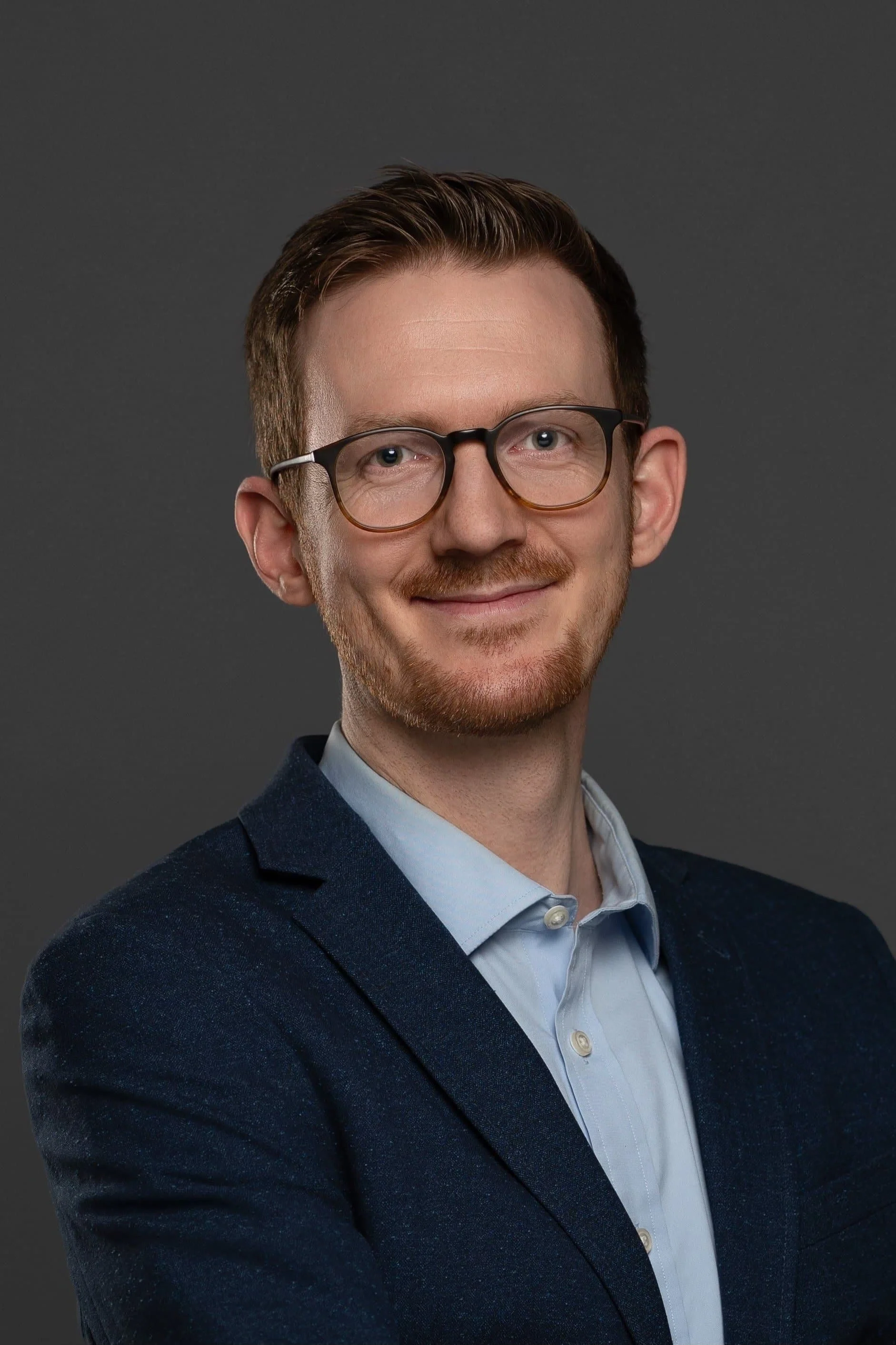 Headshot style photo of Andrew Bortz