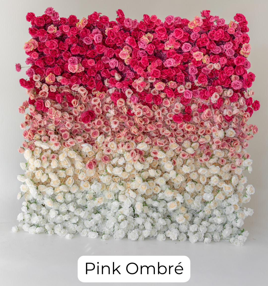 A stunning gradient blend of roses transitioning from deep pink to soft blush and white tones. The smooth color flow creates a romantic and elegant statement piece perfect for a wide range of celebrations.