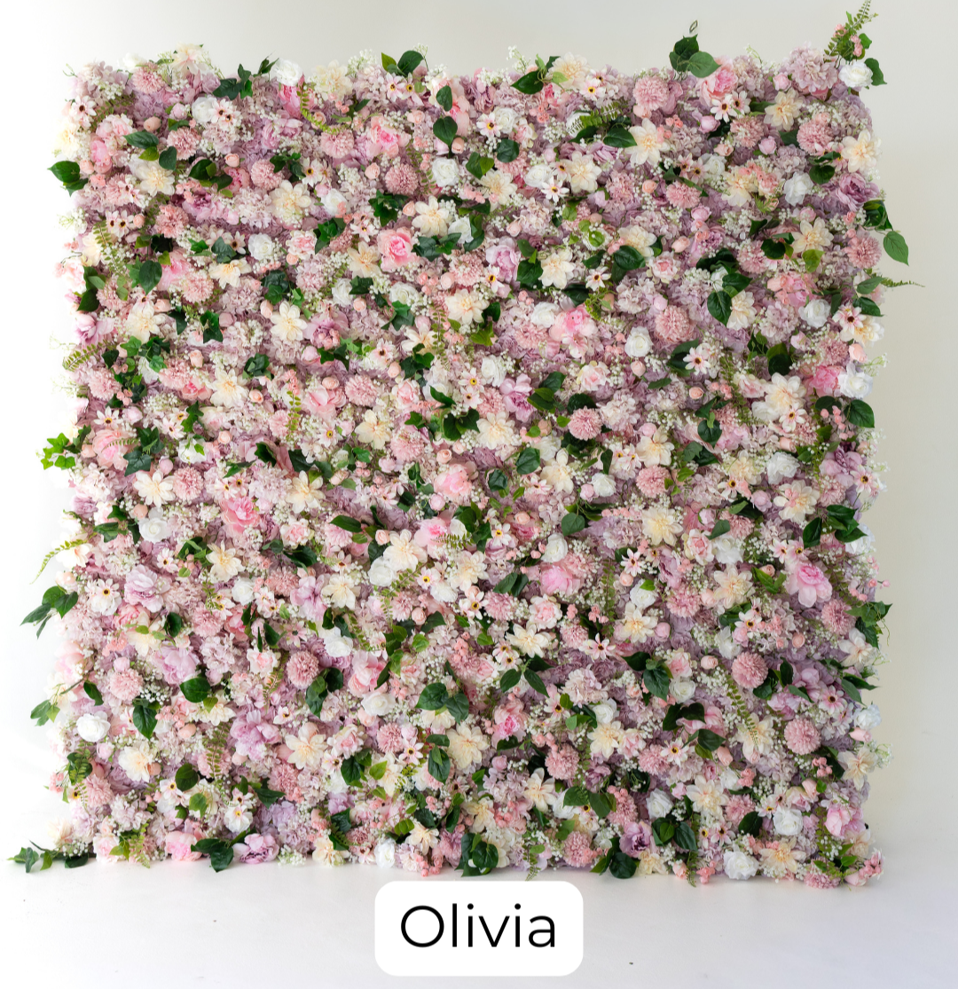 A soft blend of blush and light pink roses accented with delicate white daisies and subtle greenery. The gentle color palette creates a fresh, romantic backdrop that feels light, elegant, and timeless.