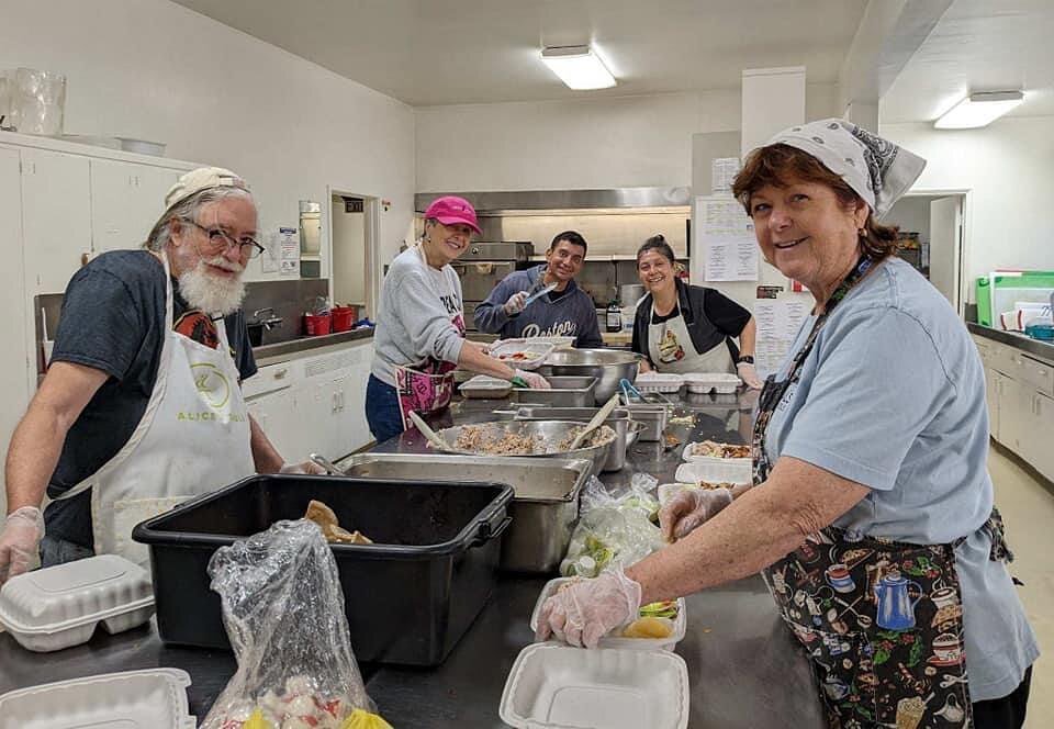 Smiles all around! Our volunteers are here Monday - Friday helping get food to our home bound neighbors.