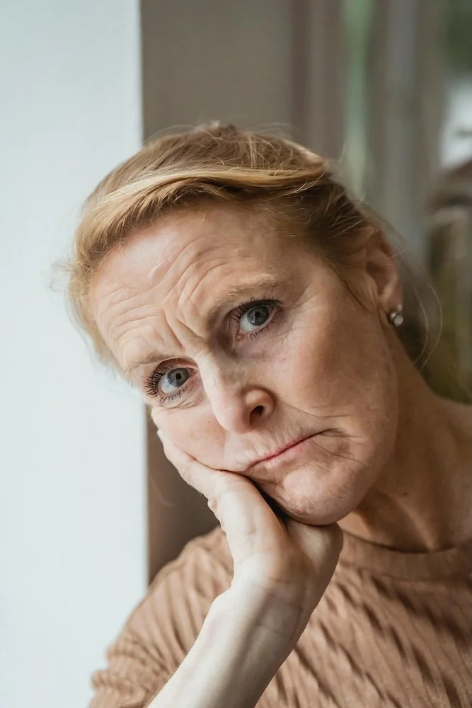 perimenopausal woman thinking