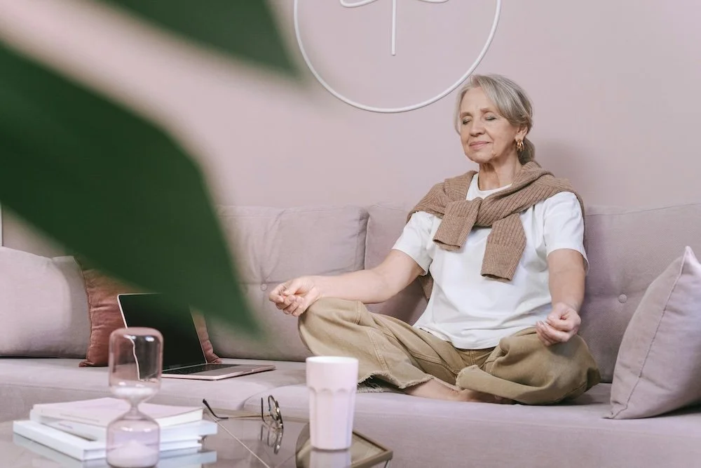 Woman menopause meditating