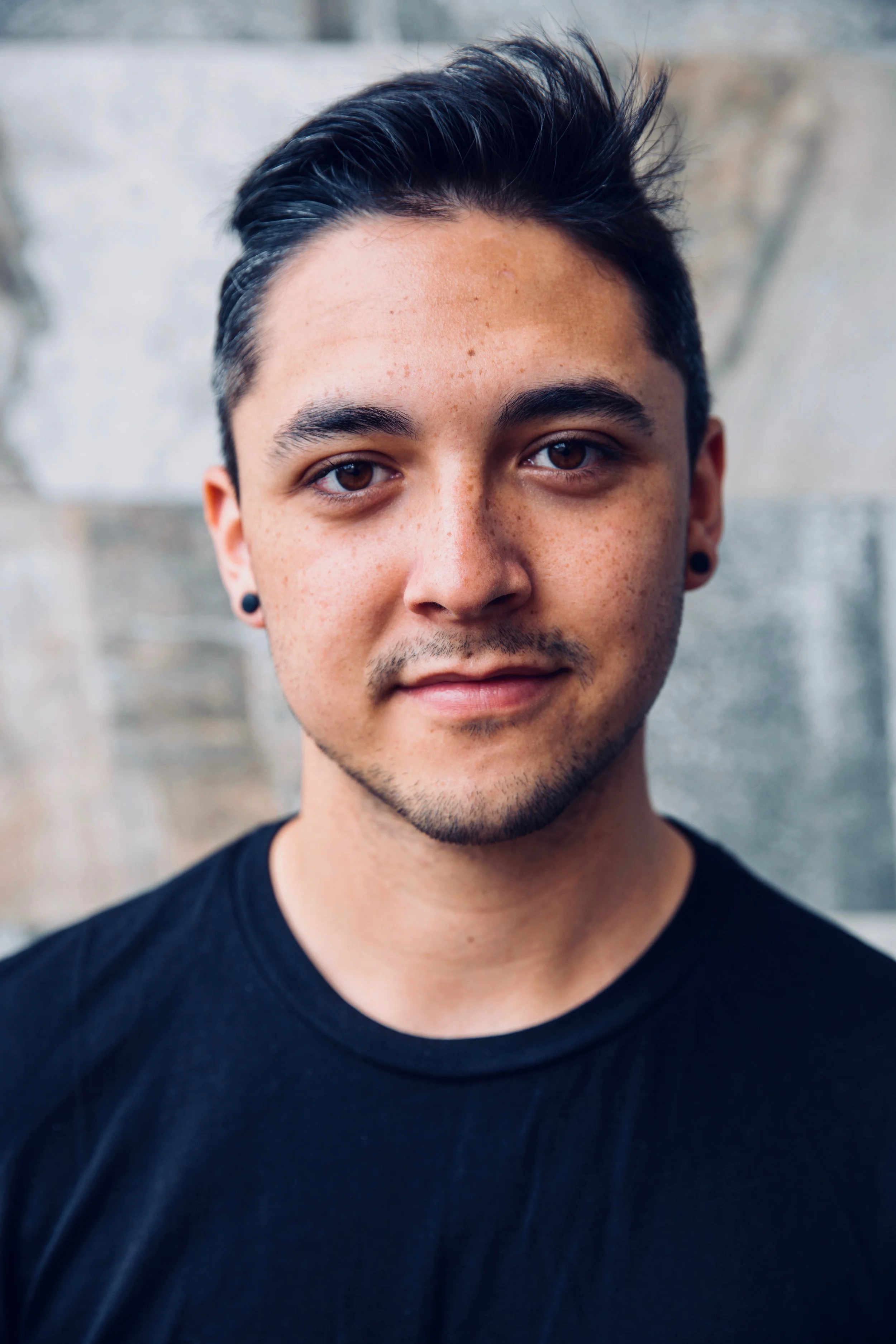 A person with short dark hair