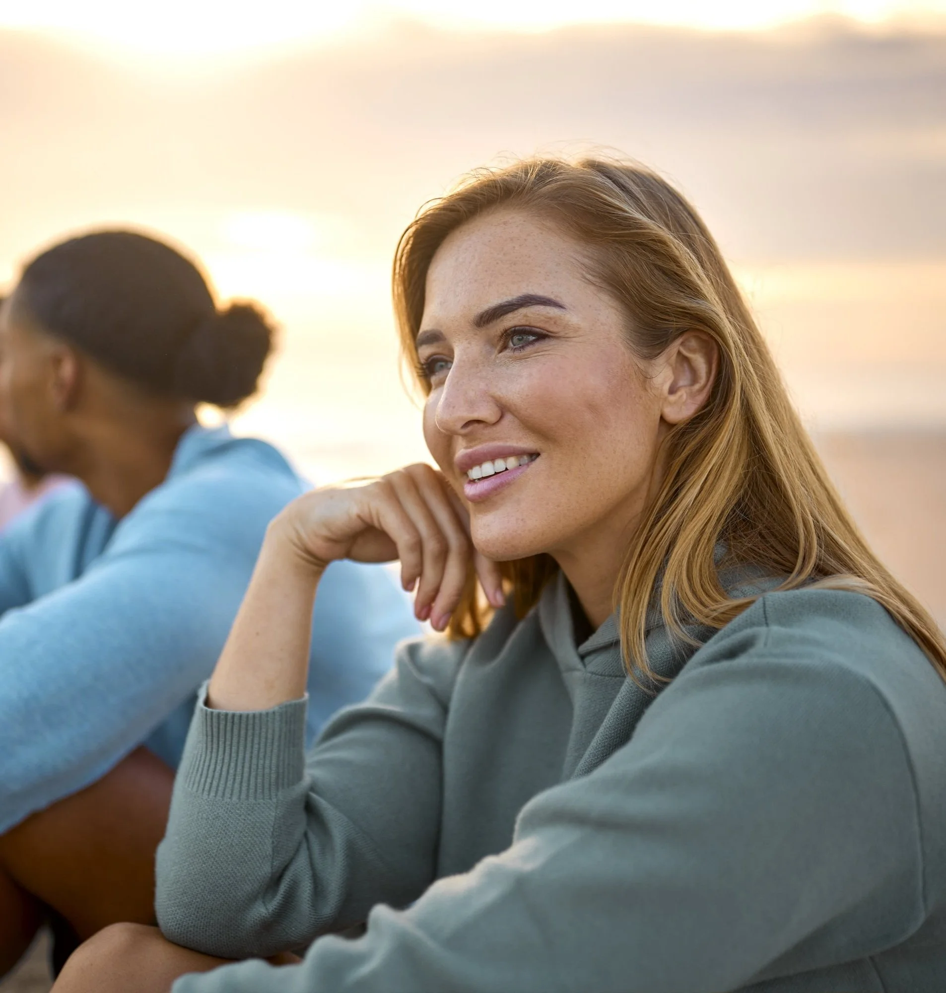 A woman looking calm and hopeful, representing the peace of mind achieved through anxiety therapy and stress management at Everthrive Counseling in New Port Richey.